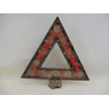 An aluminium triangular warning sign.