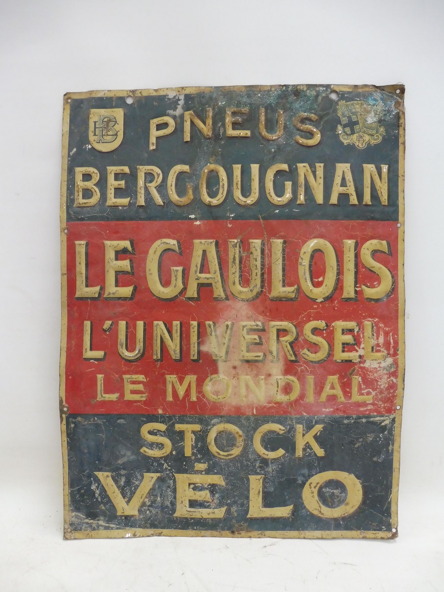 A French embossed tin advertising sign for Bergougnan Tyres, 17 3/4 x 23 3/4".