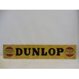 A Dunlop Stock rectangular aluminium advertising sign dated December 1951, 59 x 11 1/4".