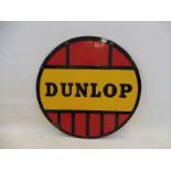 A Dunlop circular double sided enamel sign, 24" diameter.