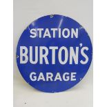 An unusual circular enamel sign advertising Burton's Station Garage, 36" diameter.