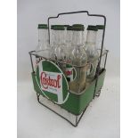 A Wakefield Castrol Motor Oil nine bottle crate with enamel signs all round and nine correct Castrol