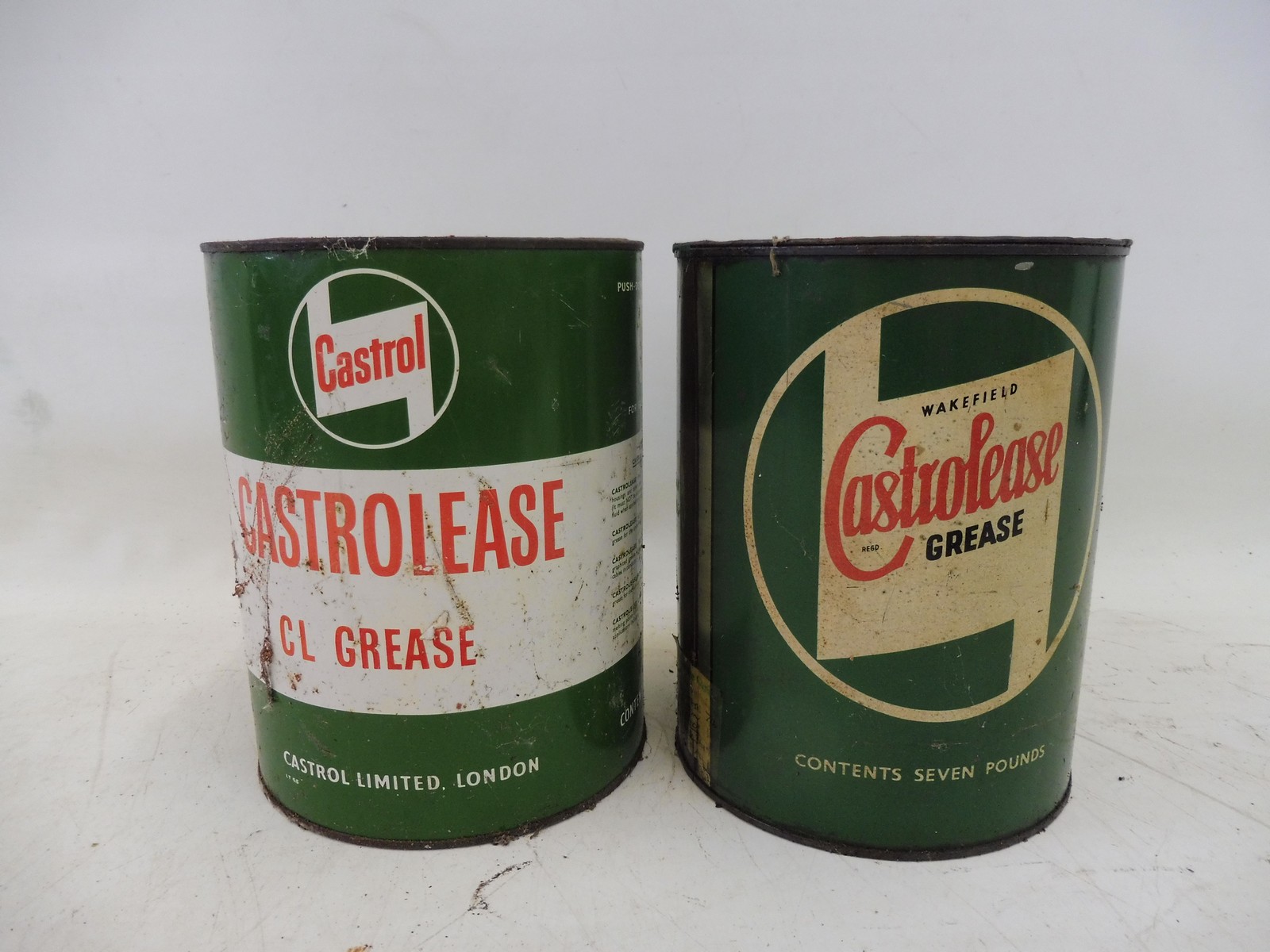 A Wakefield Castrolease 7lb grease tin and a later version circa 1950s.