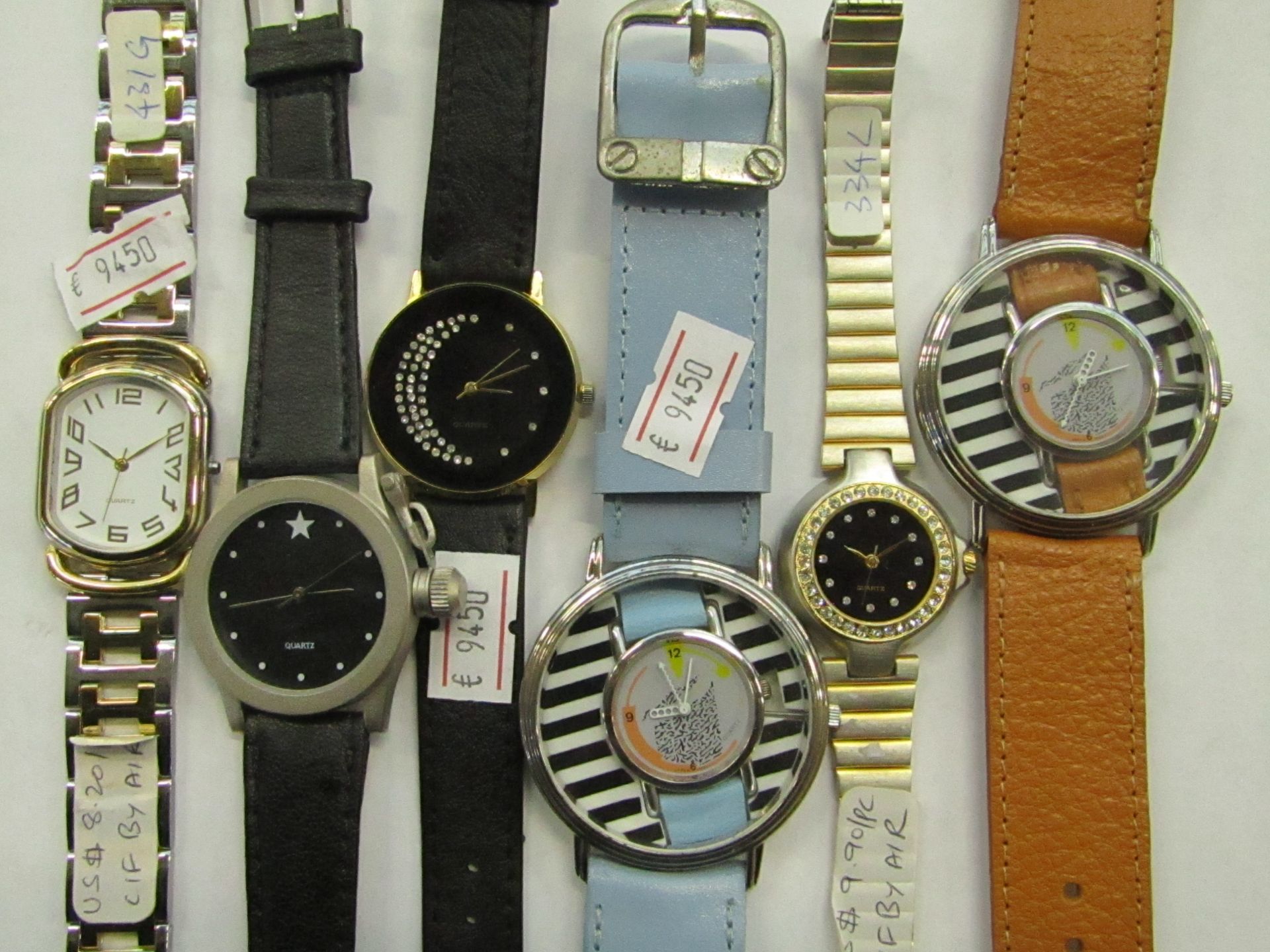 10 x Watches (see image for design) packaged