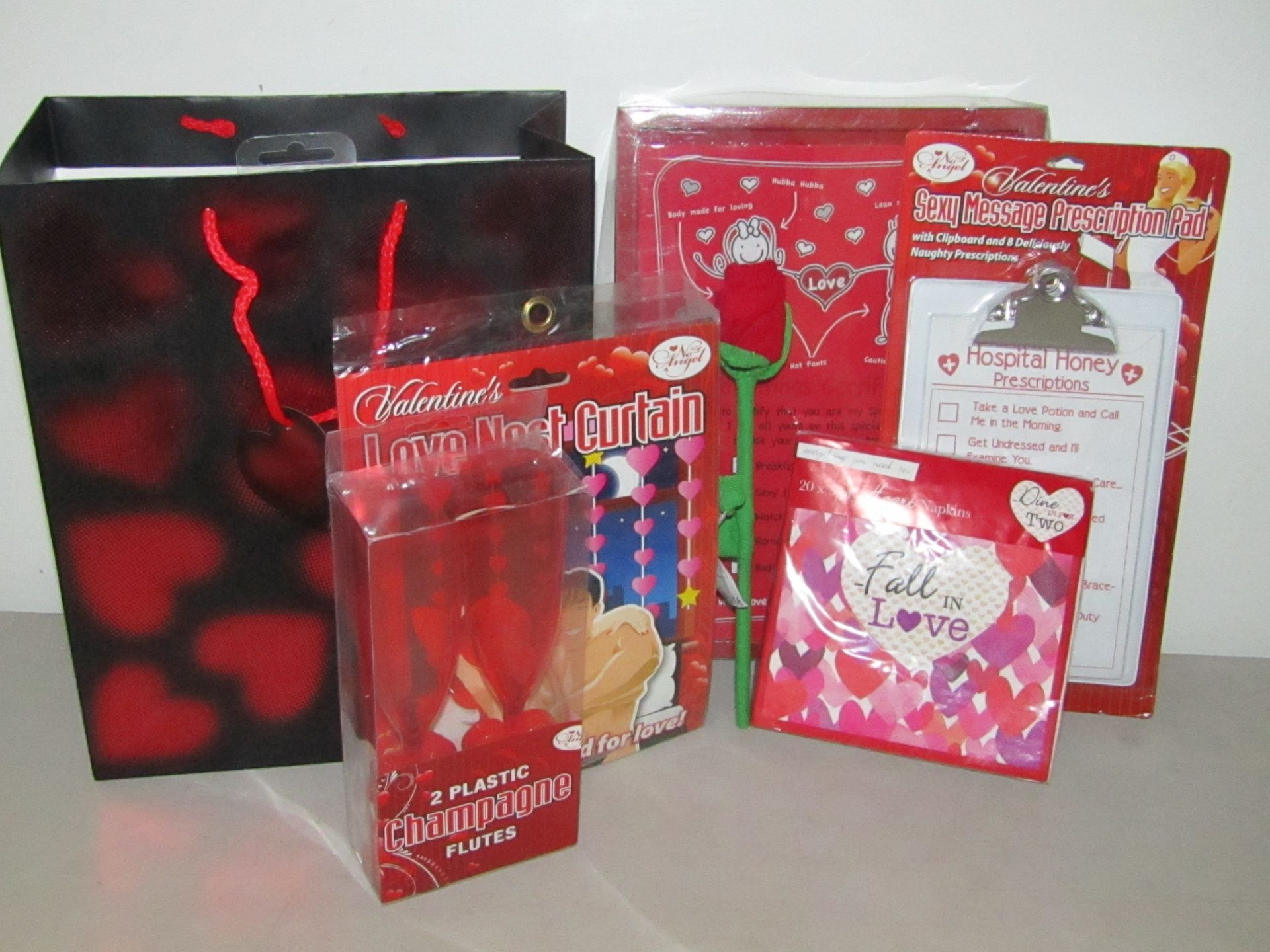 7 Piece Valentines Gift set which includes, Gift Bag, Certificate, Sexy Message Prescription Pad,