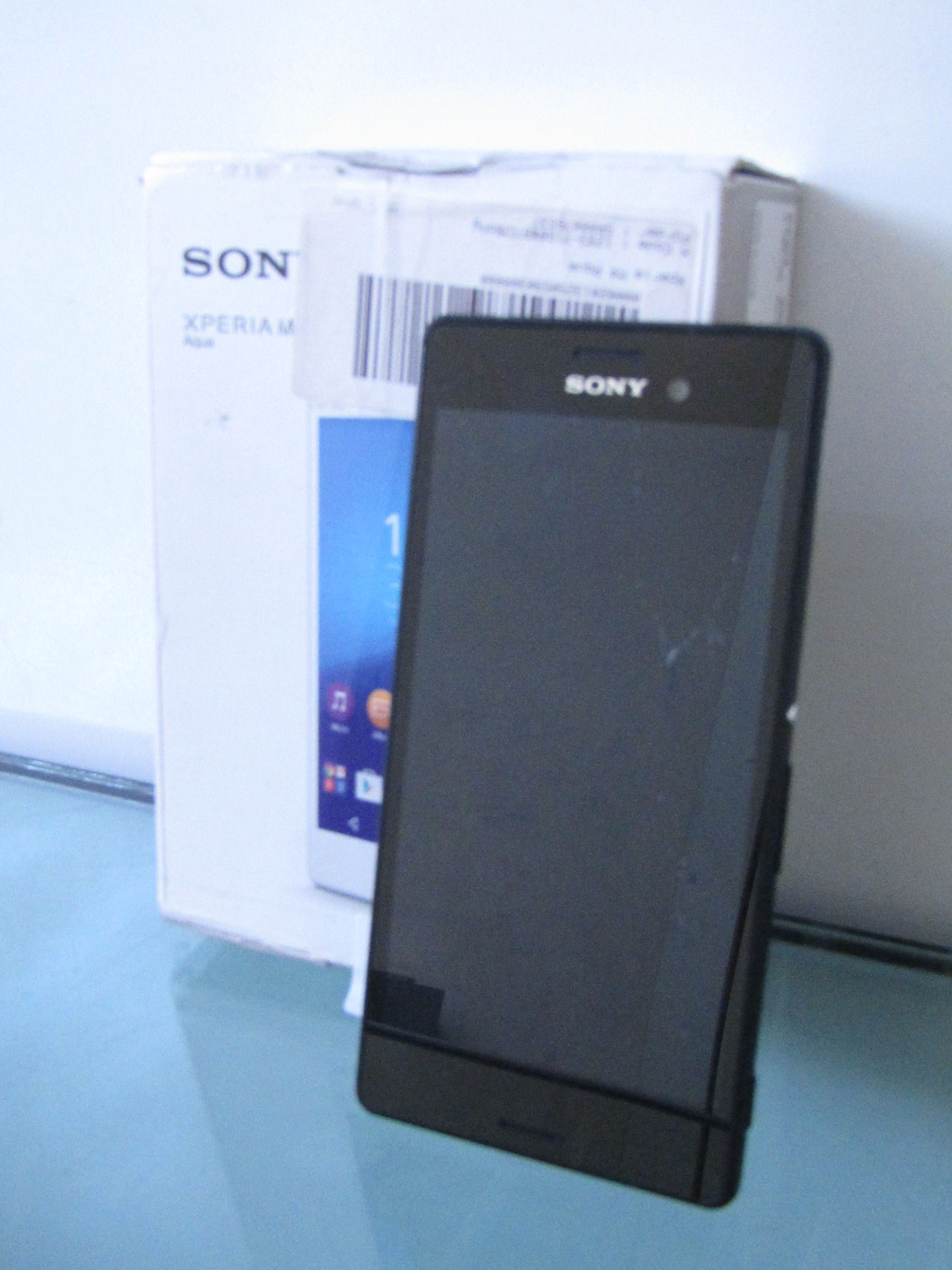 Sony Xperia Smart Phone, No Power, with a Box for a Xperia M4 Aqua