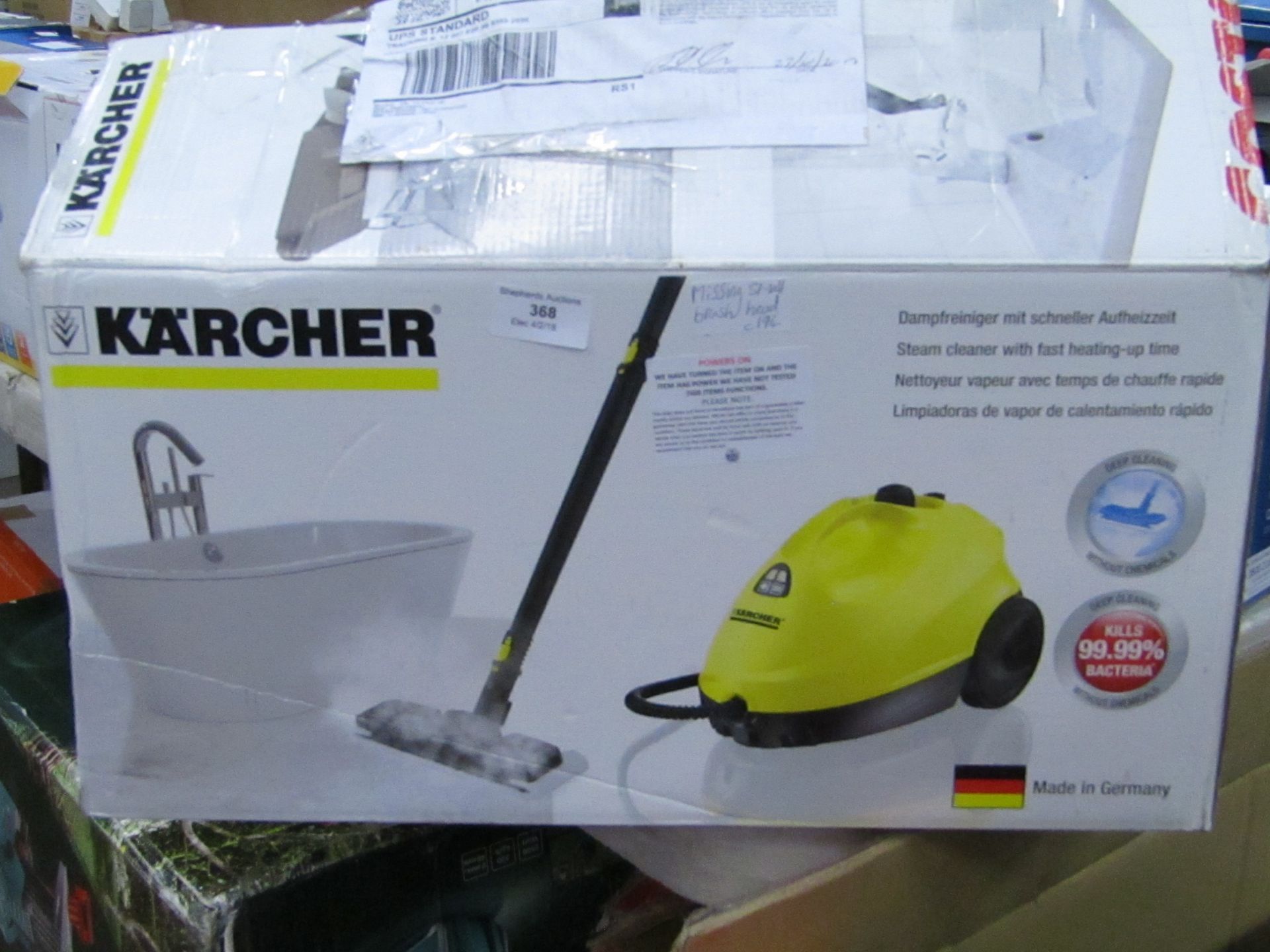 Karcher Steam Cleaner powers on and Boxed but is missing a small brush head.