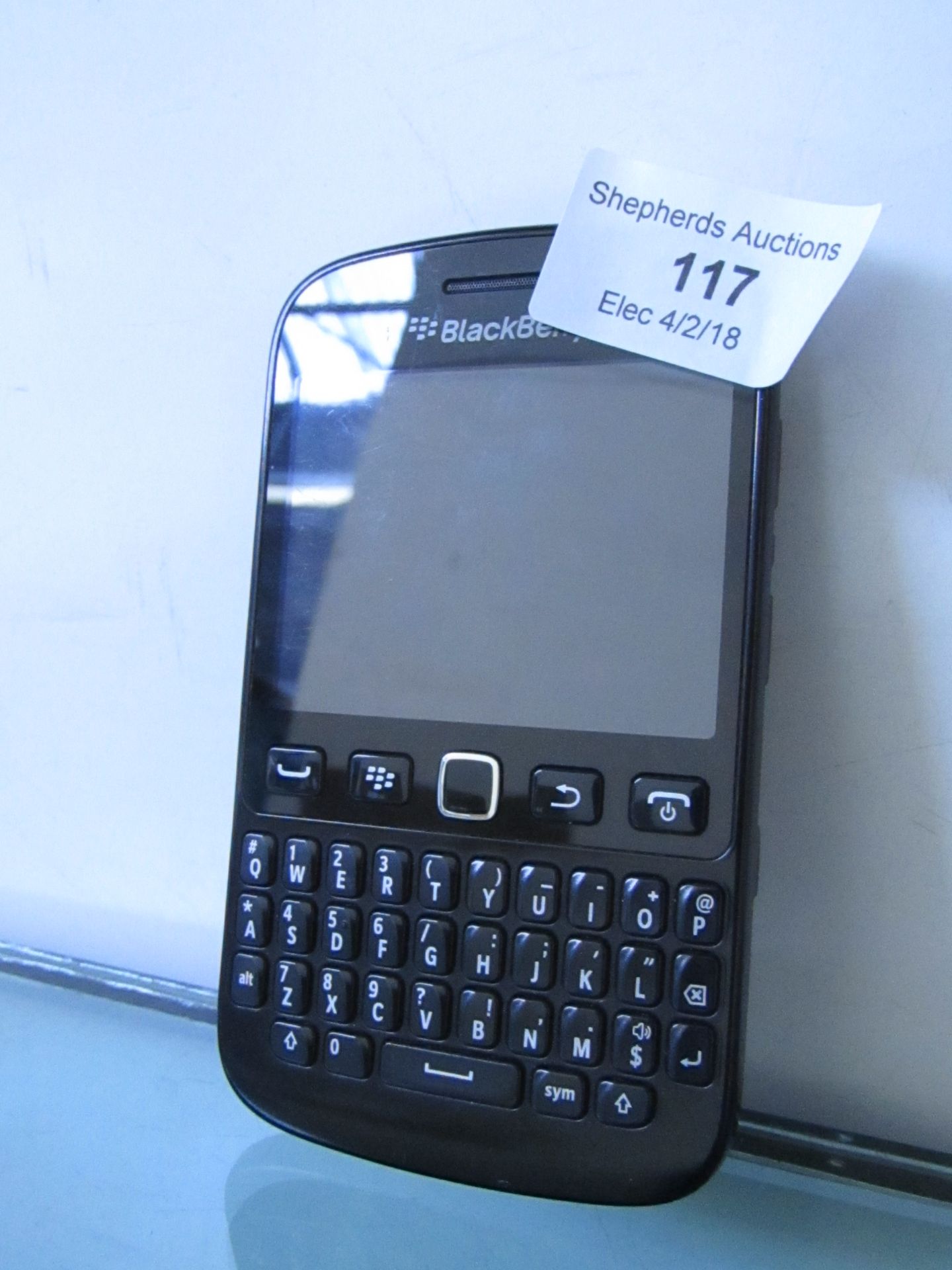 Blackberry 9720 Phone with charger, Powers on