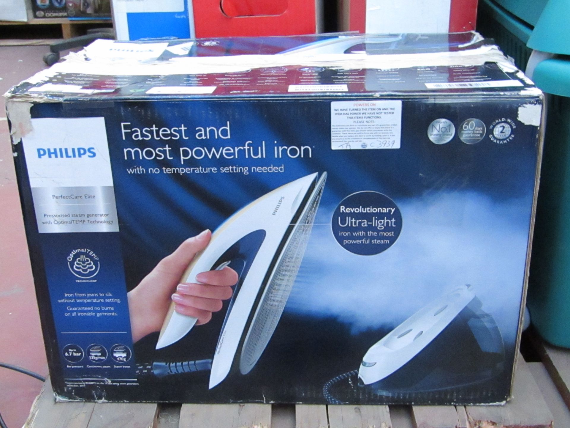 Philips ultra-light iron. Powers on. Boxed.