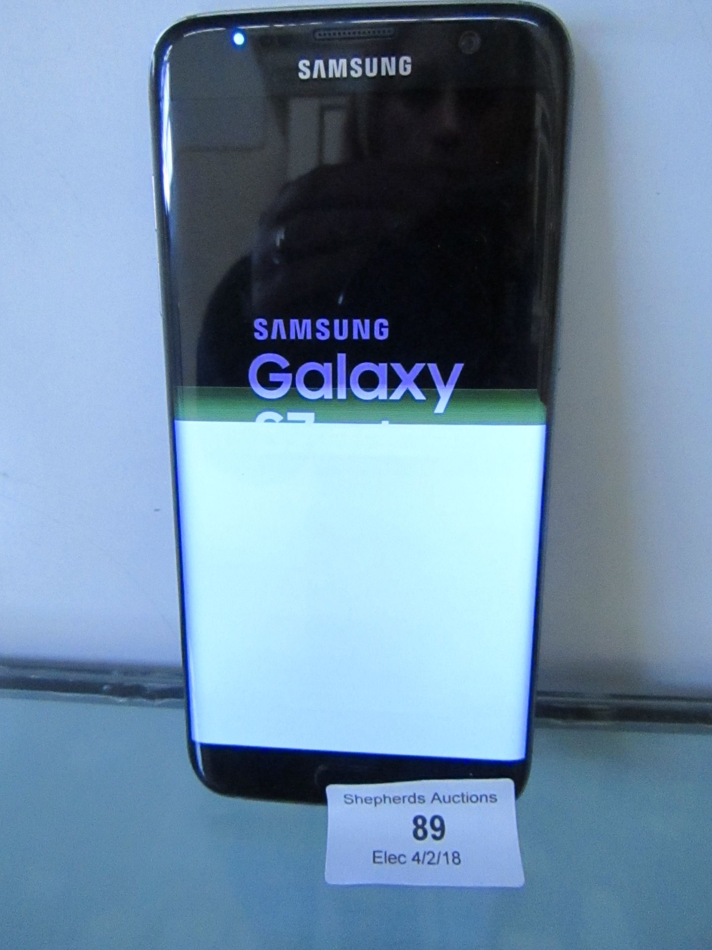 Samsung Galaxy S7 Edge, Powers on but has screen fault, with charging cable