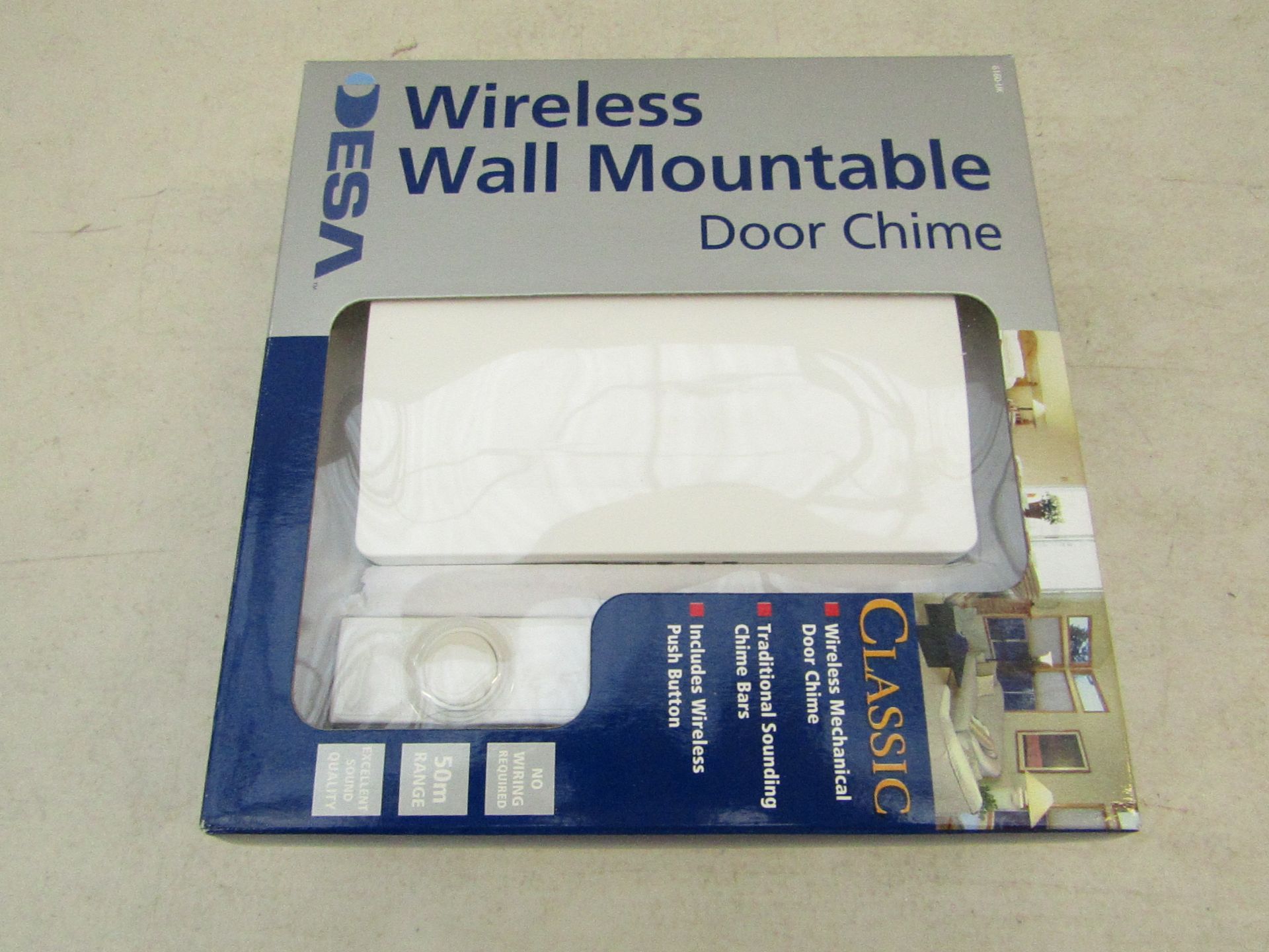 Desa wireless wall mounted door chime, new and packaged.