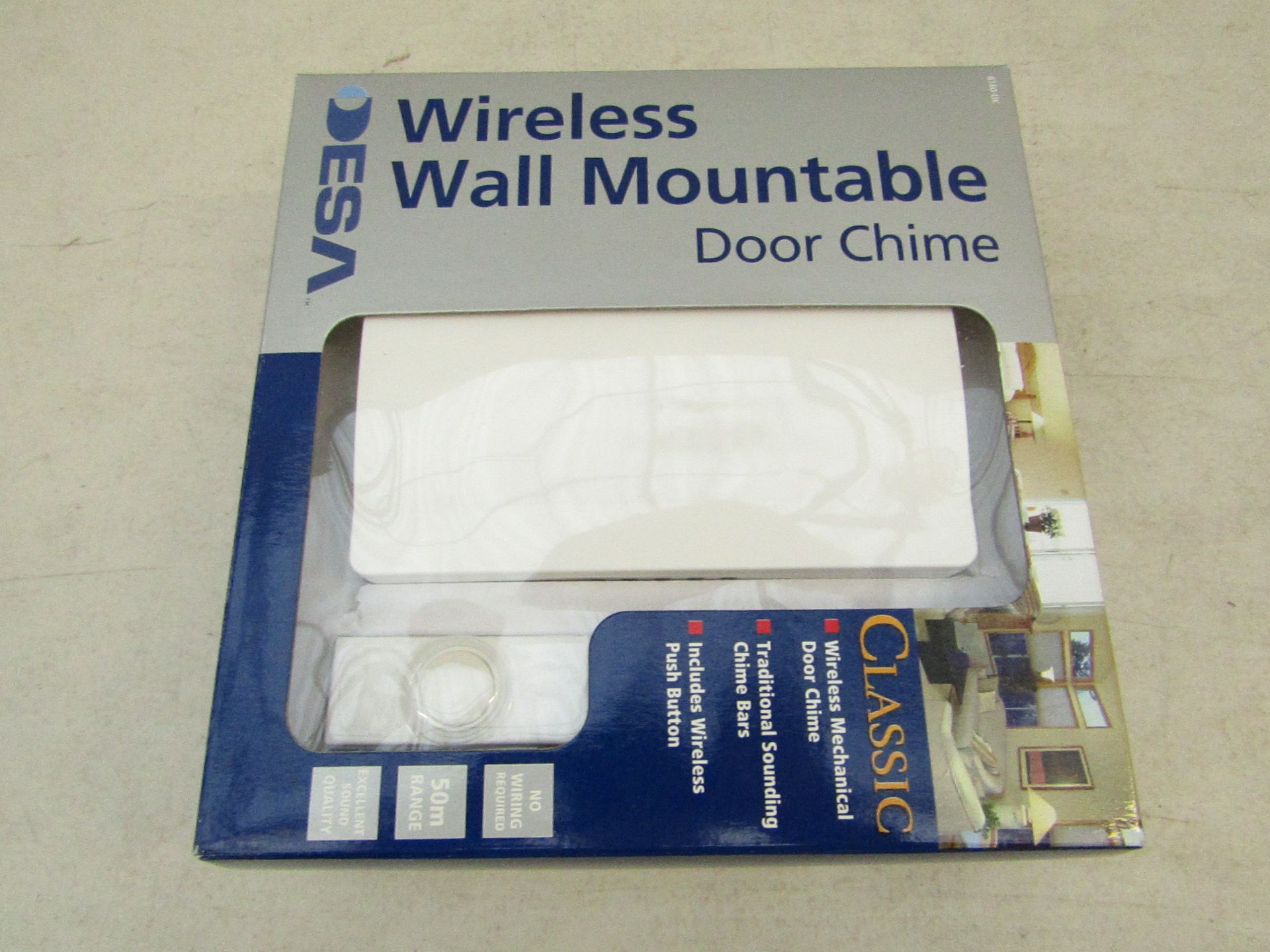 Desa wireless wall mounted door chime, new and packaged.