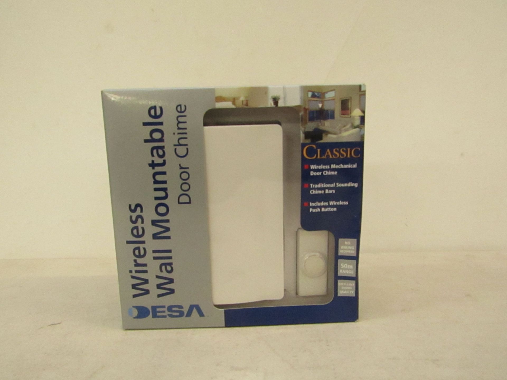 DESA wireless wall mountable door chime, new and boxed.