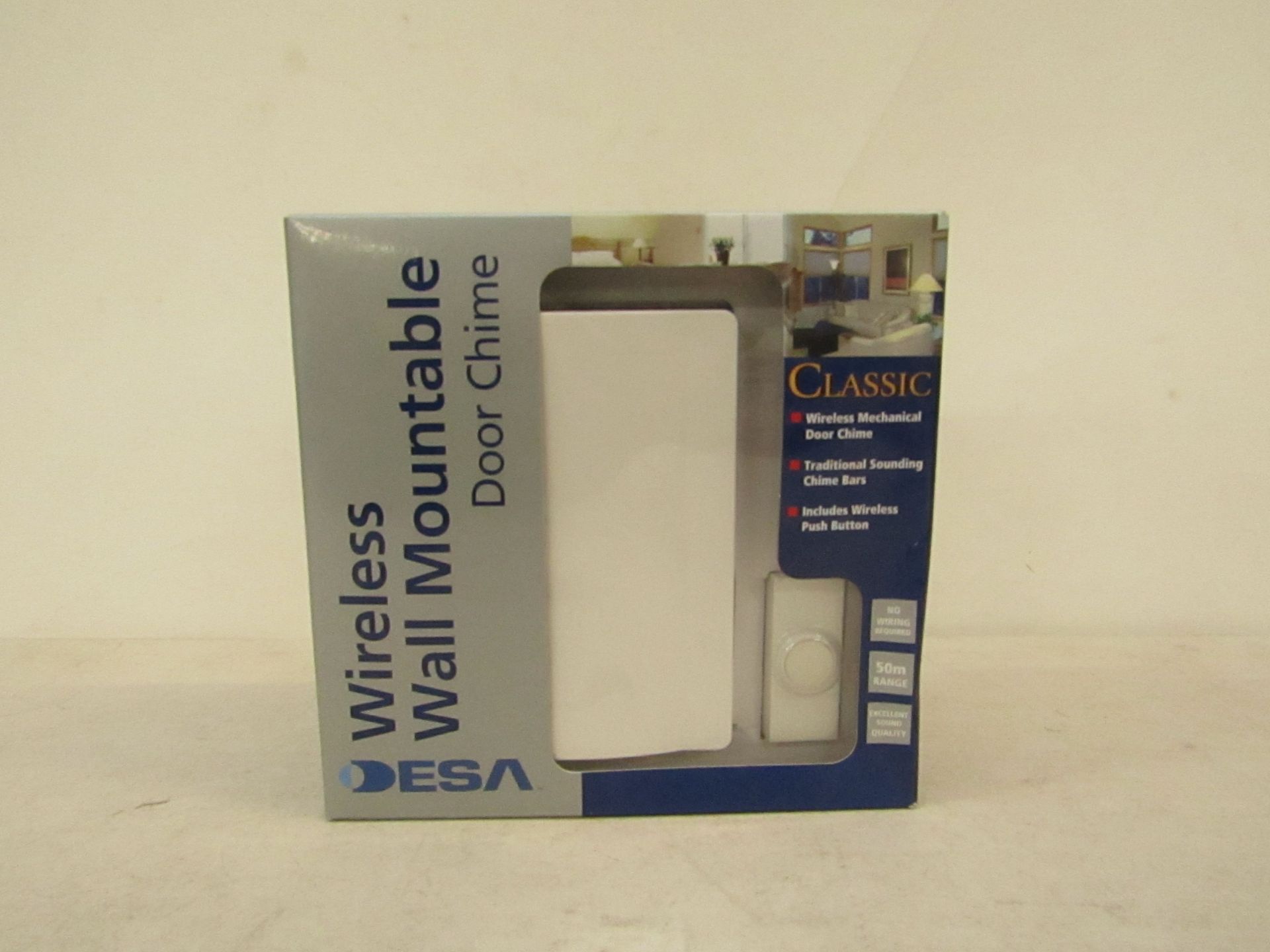 DESA wireless wall mountable door chime, new and boxed.