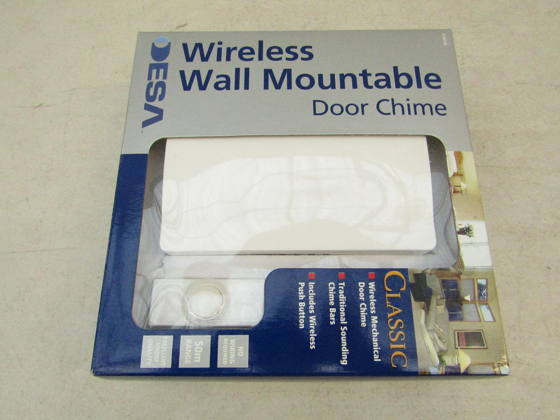 Desa wireless wall mounted door chime, new and packaged.