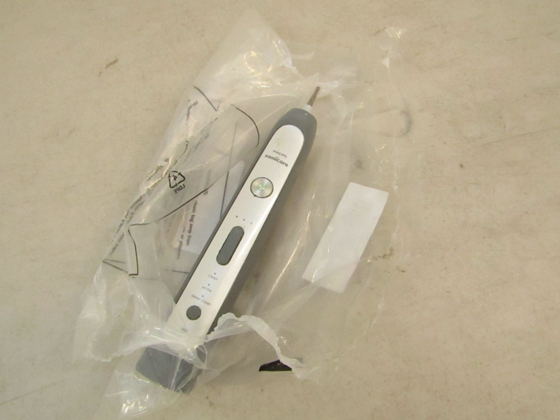 Phillips sonicare electric toothbrush, no heads with it but turns on.