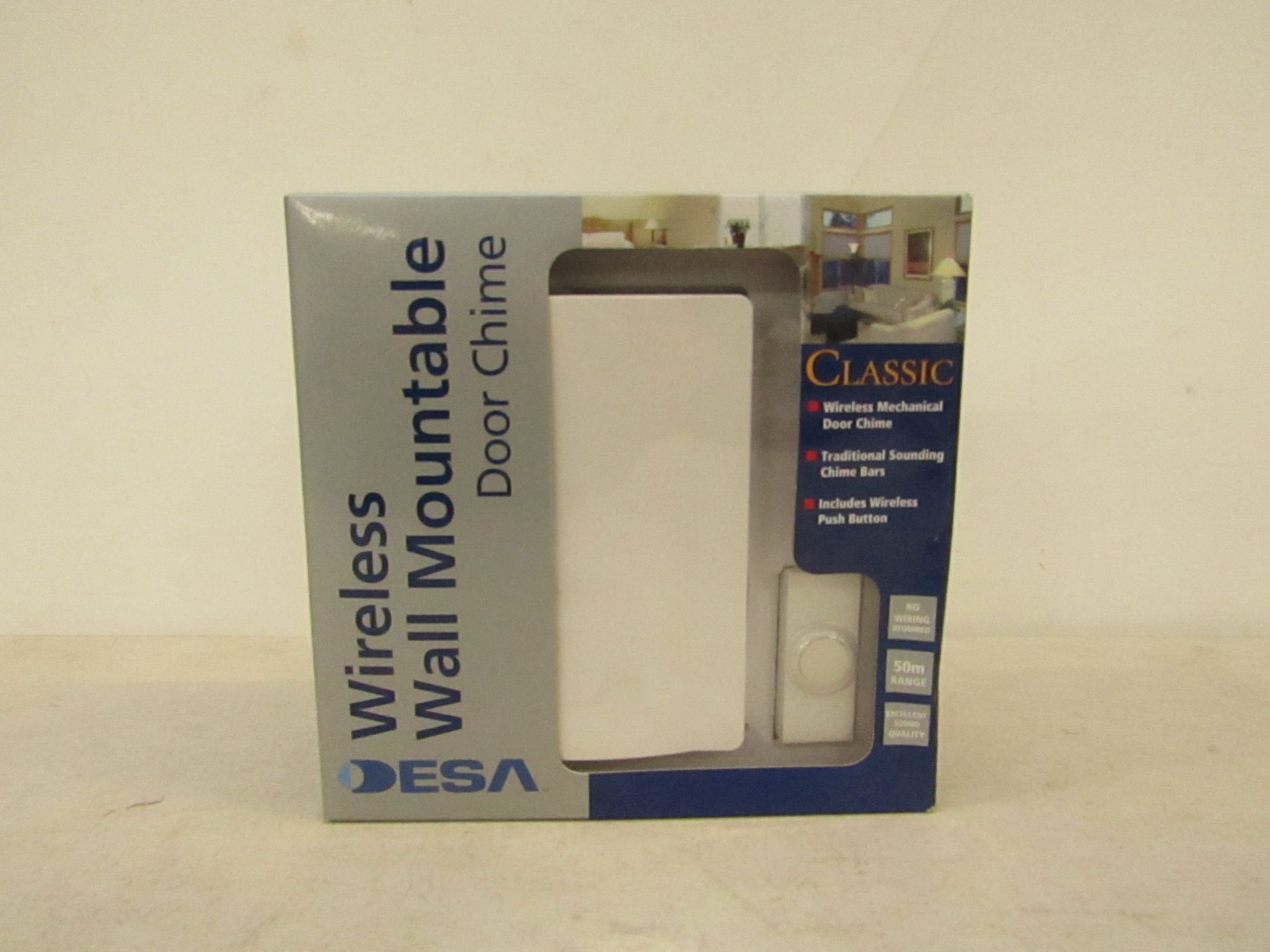 DESA wireless wall mountable door chime, new and boxed.