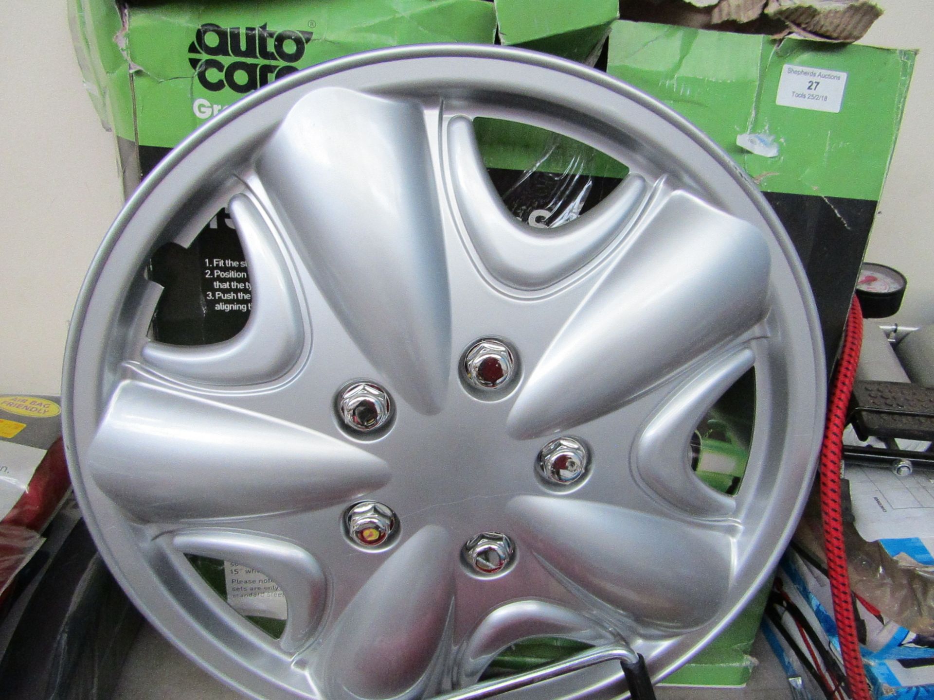 Auto Care 15" wheel cover set, unchecked and boxed.