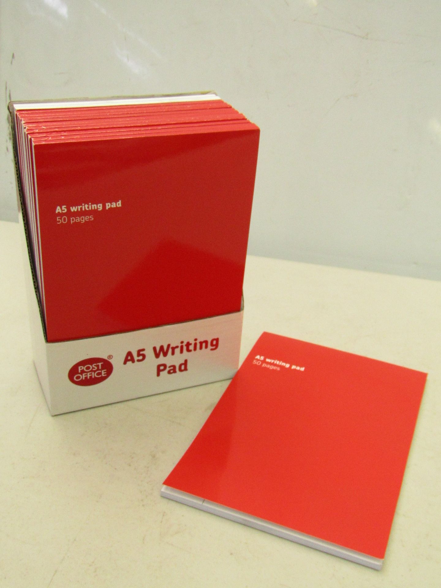 4x boxes of Post Office A5 writing pads. Each box contains 12x writing pads, each pad contains 50
