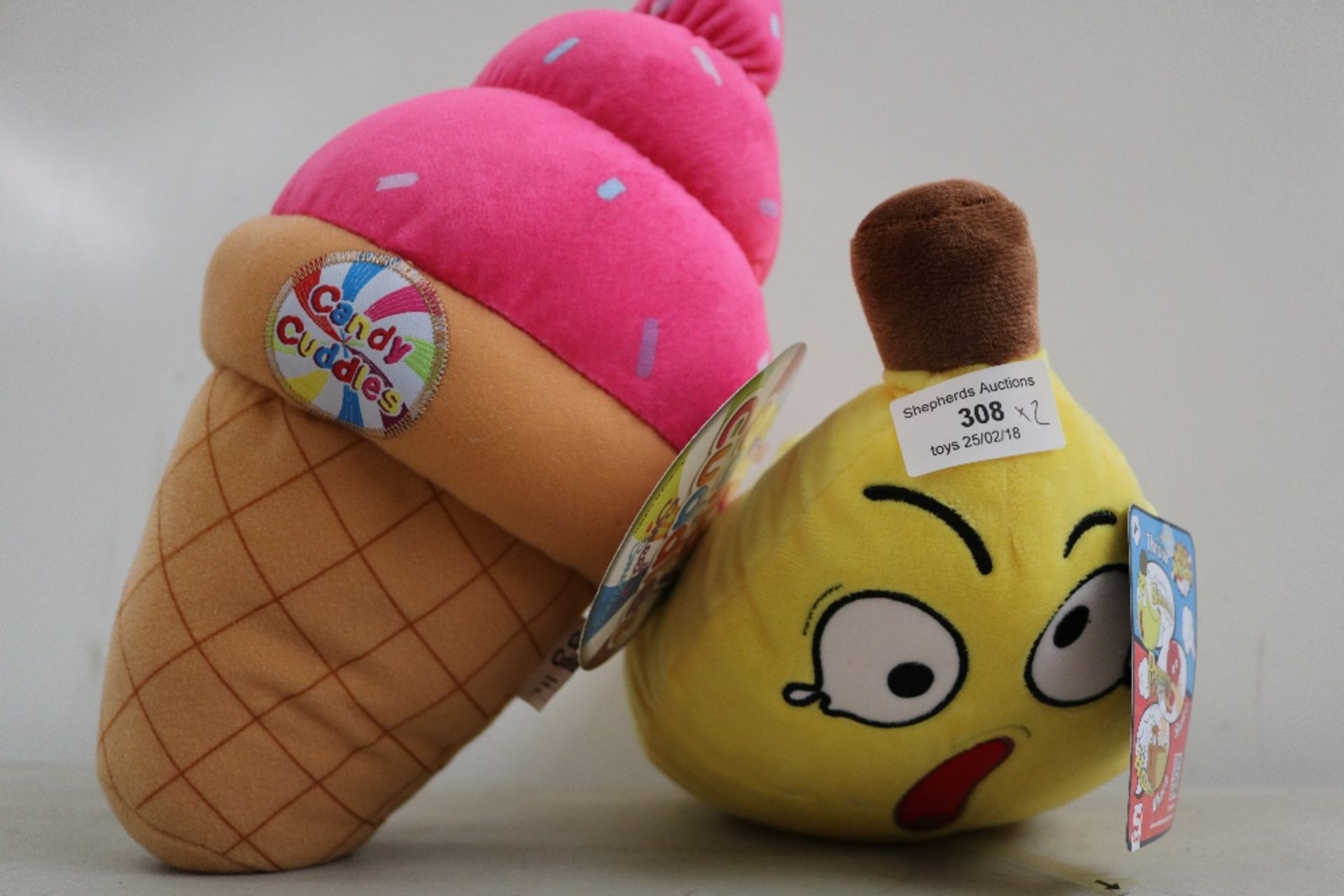 2x Plush toys one in the shape of an ice cream cone and the other a banana, both new.