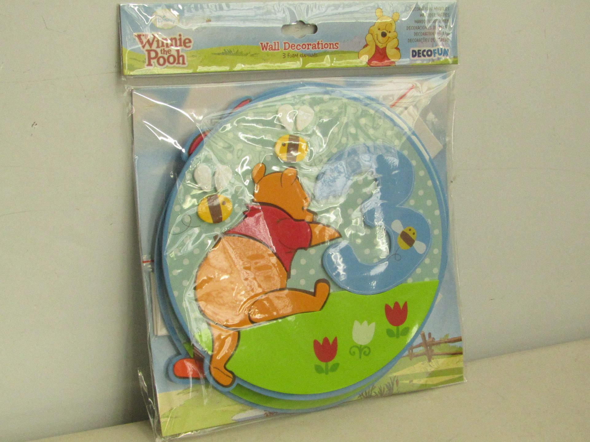 16x packs each containing 3 Winnie the Pooh wall decorations. All new in packaging.