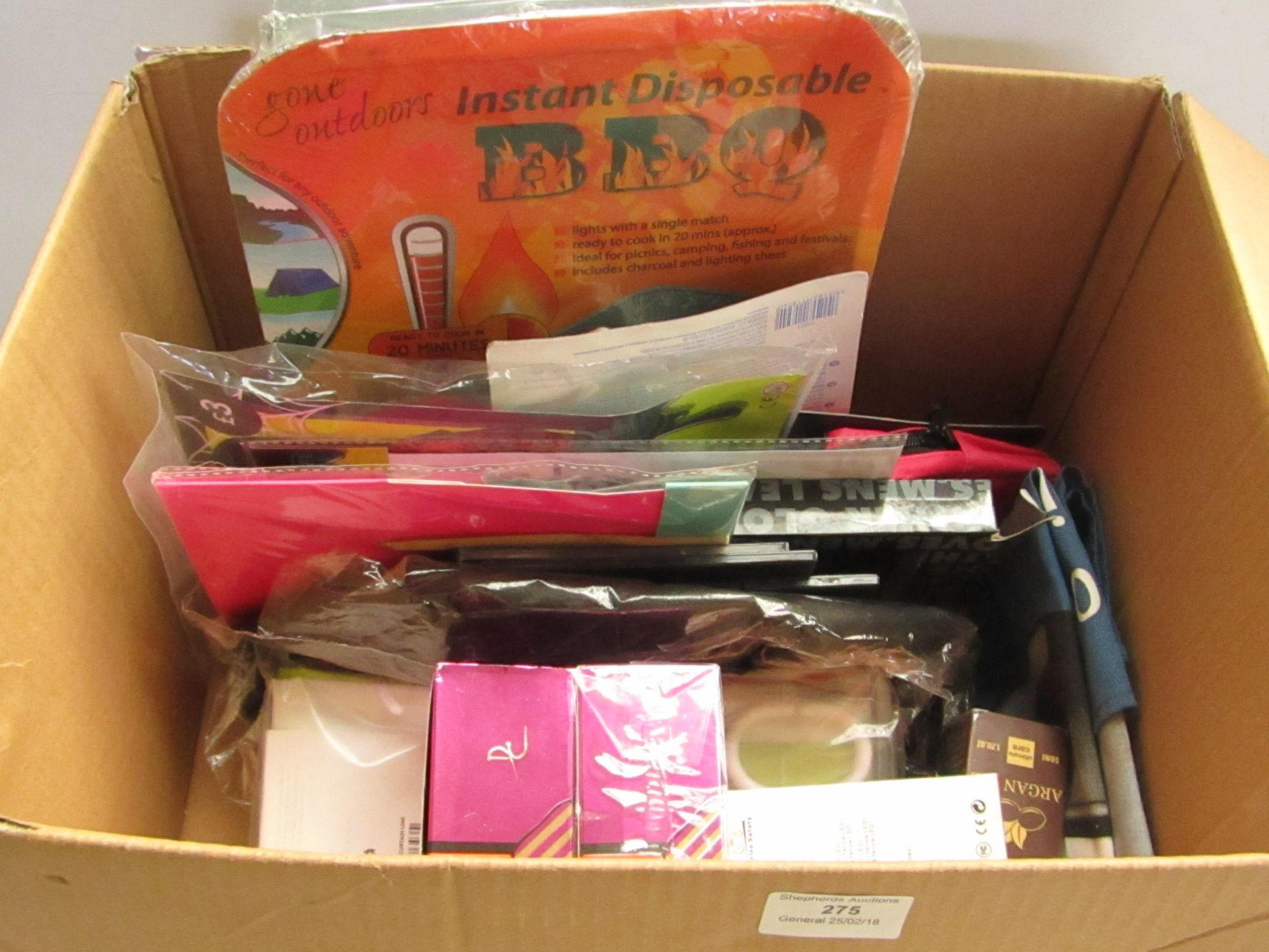Box containing various items including disposable BBQ, 2x Dorall Collection Love You Like Crazy