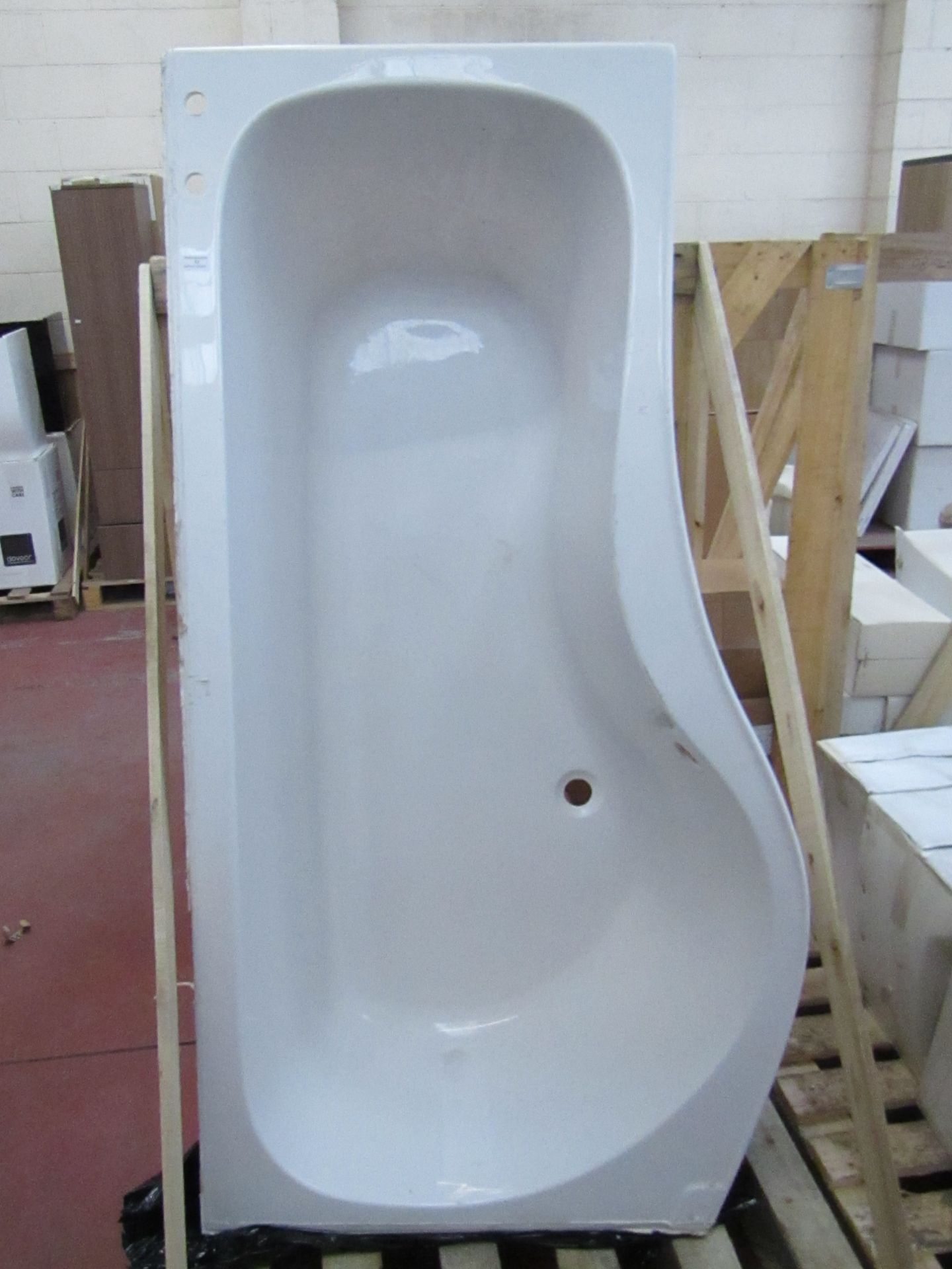 White colour left hand curved bath, 1700mm x 900mm, has been previously fitted as a display (sealant