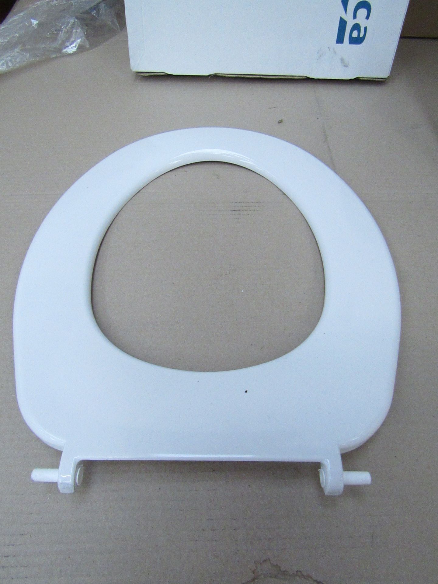 Box of 5x Roca access toilet seats, (NO LID INCLUDED), White colour. New and boxed.