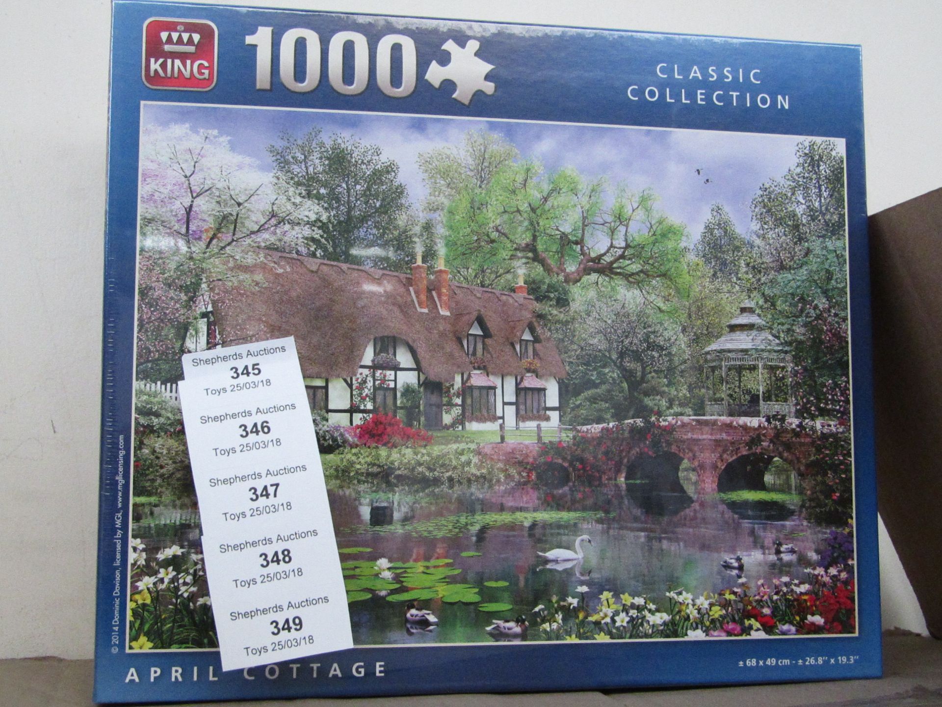 King 1000 piece april cottage jigsaw puzzle, new and factory sealed in packaging.