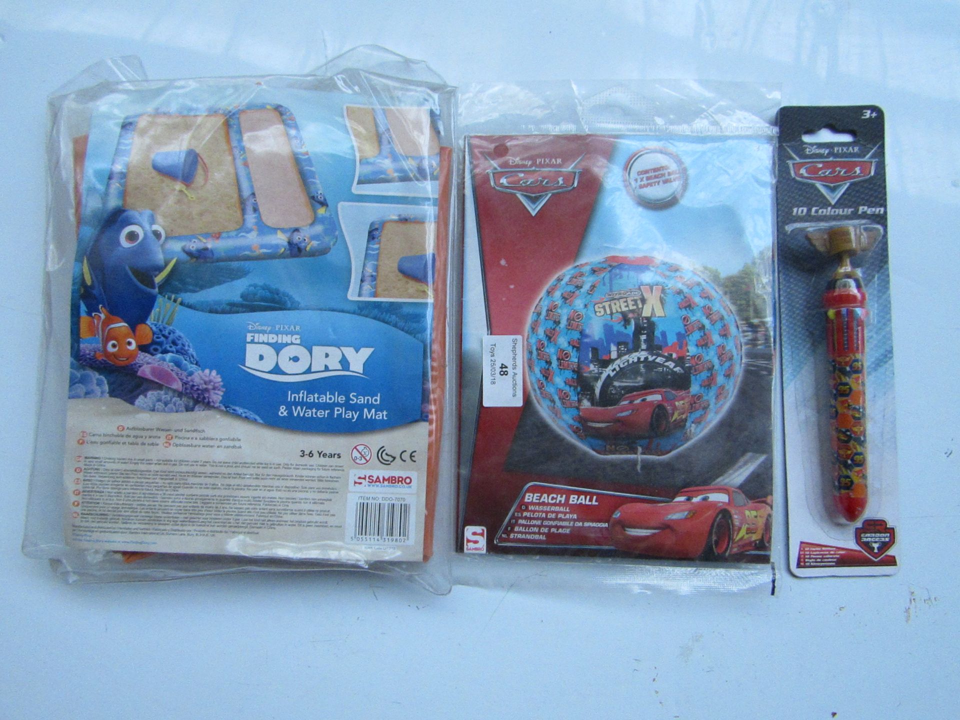 3x Items being.   - Disney Pixar Cars 10 colour pen, new and packaged.   - Disney Pixar Cars beach