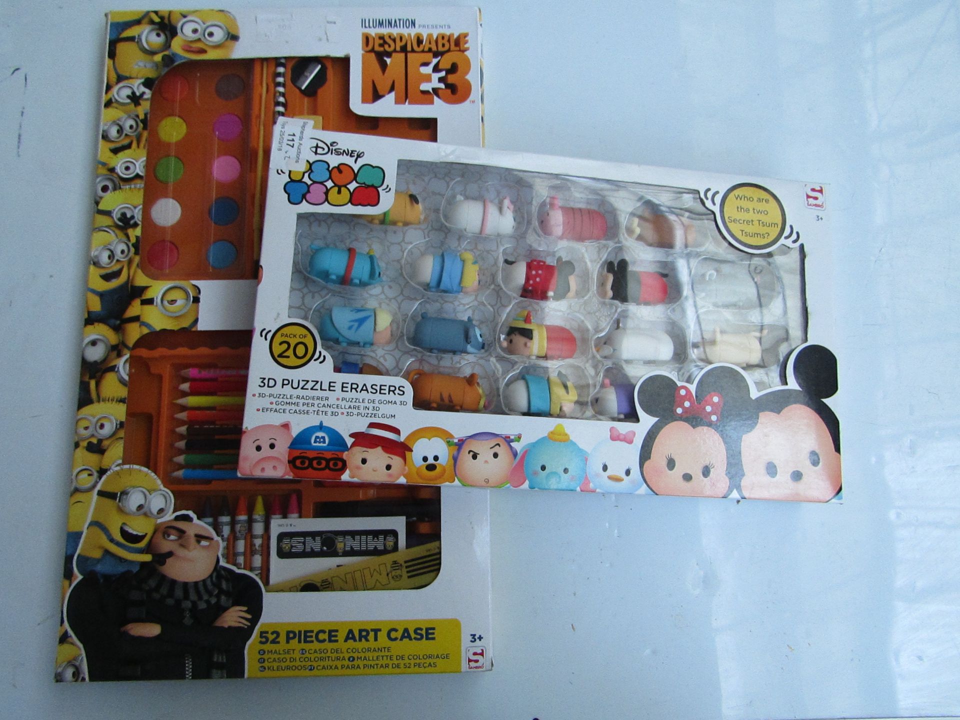 2x Items being.  - Disney Tsum Tsum 3D Puzzle Erasers pack of 20, new and boxed.  - 'Despicable me