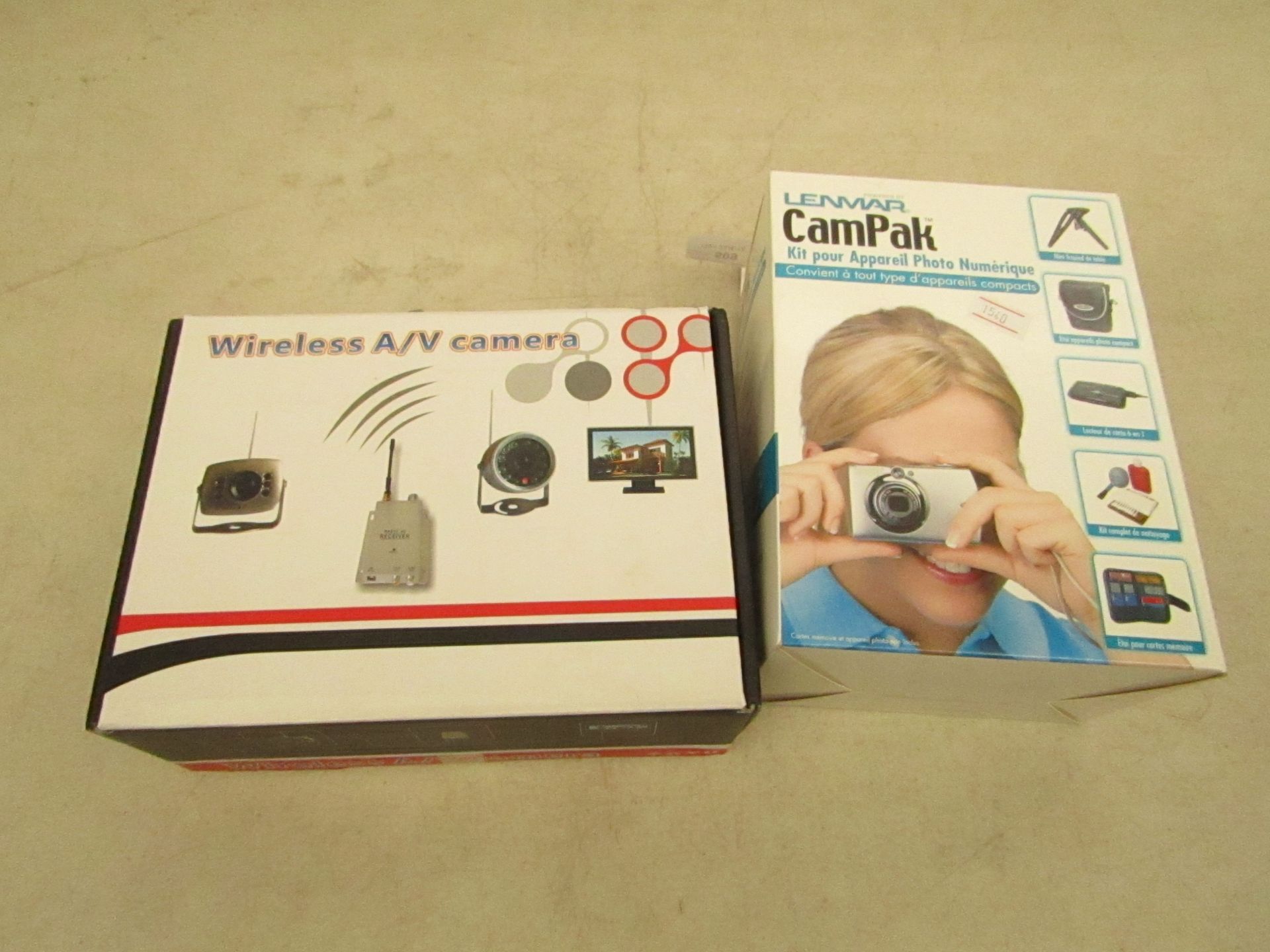 4x Items being; 2x Lenmar campak photo kit, both unchecked and boxed 2x Wireless A/V camera, both