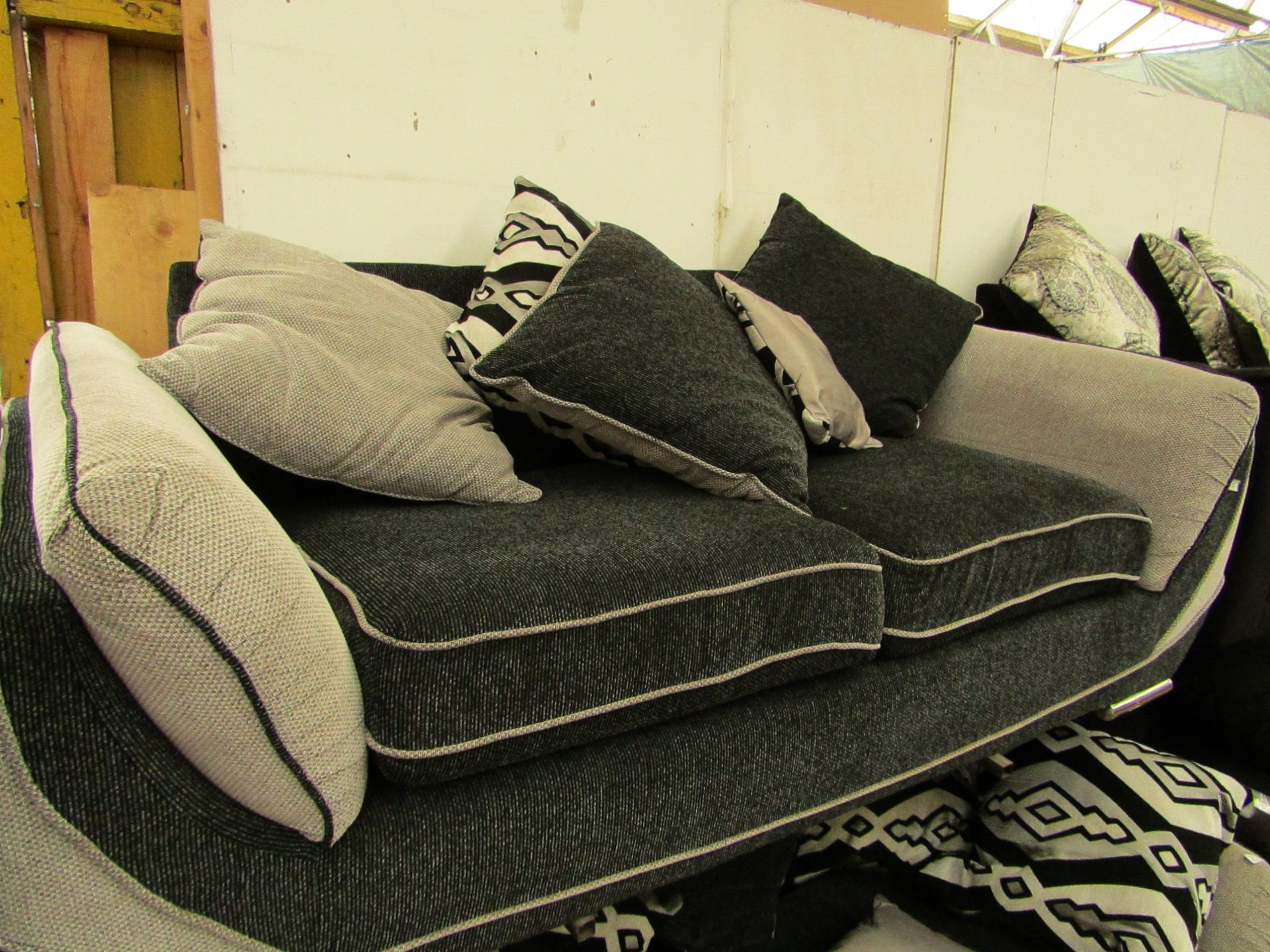 2 Seater sofa, no damage found under quick inspection, comes with 5 cushions. Dimensions : W80",