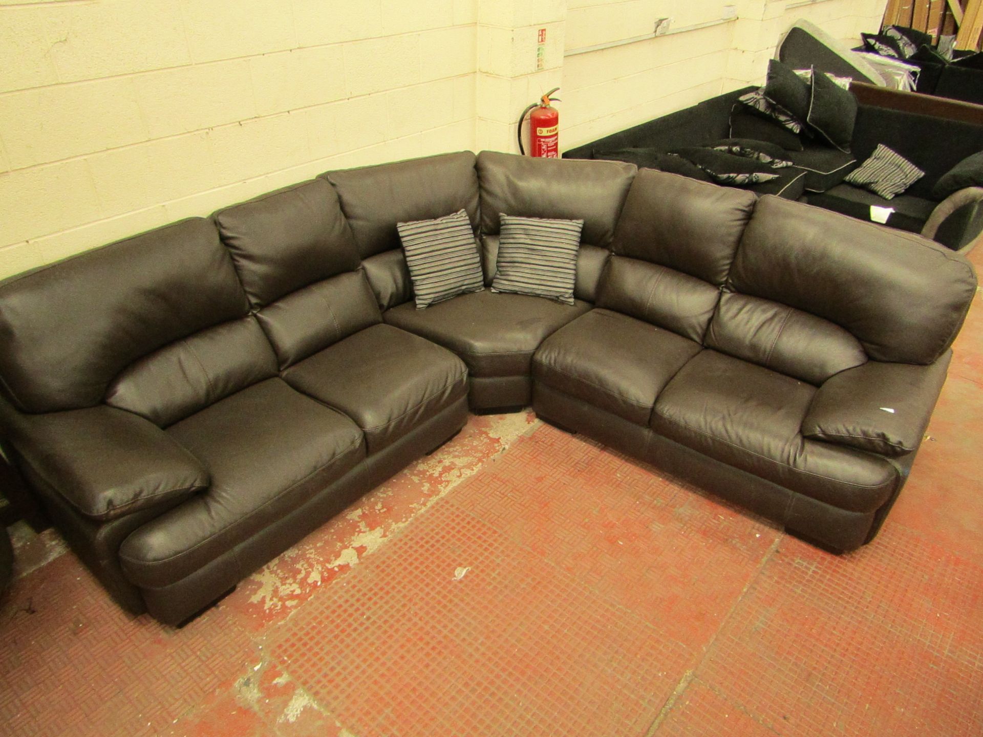 3 Piece 5 seater leather sofa with 2 cushions, minor scuff marks found on the front of one arm, this