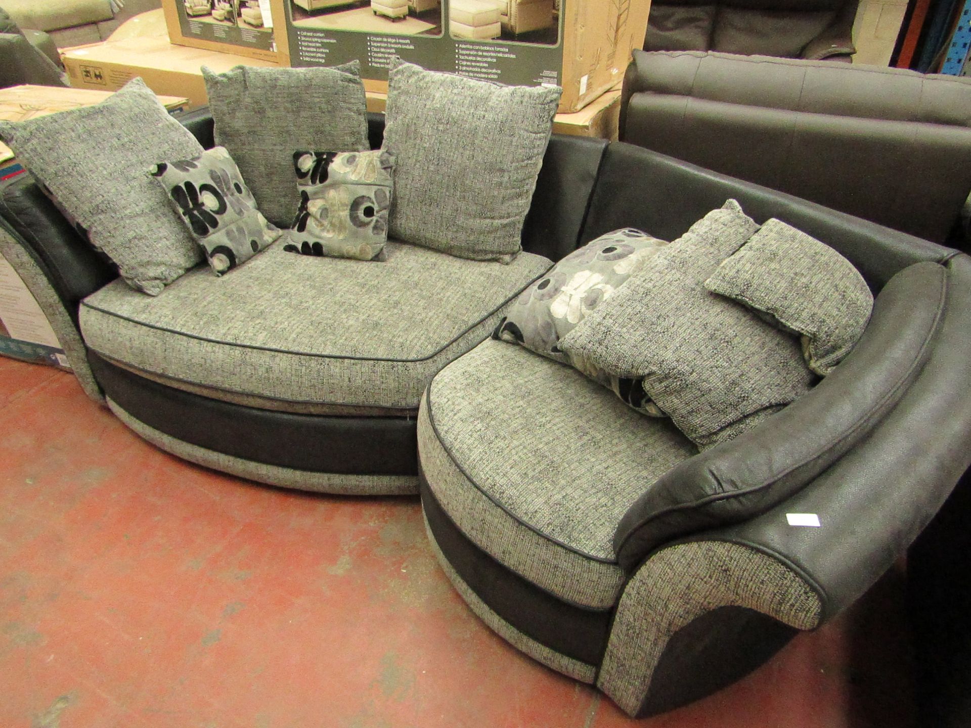 3 Seater angled sofa, no visible damage under quick inspection, comes with 8 cushions.