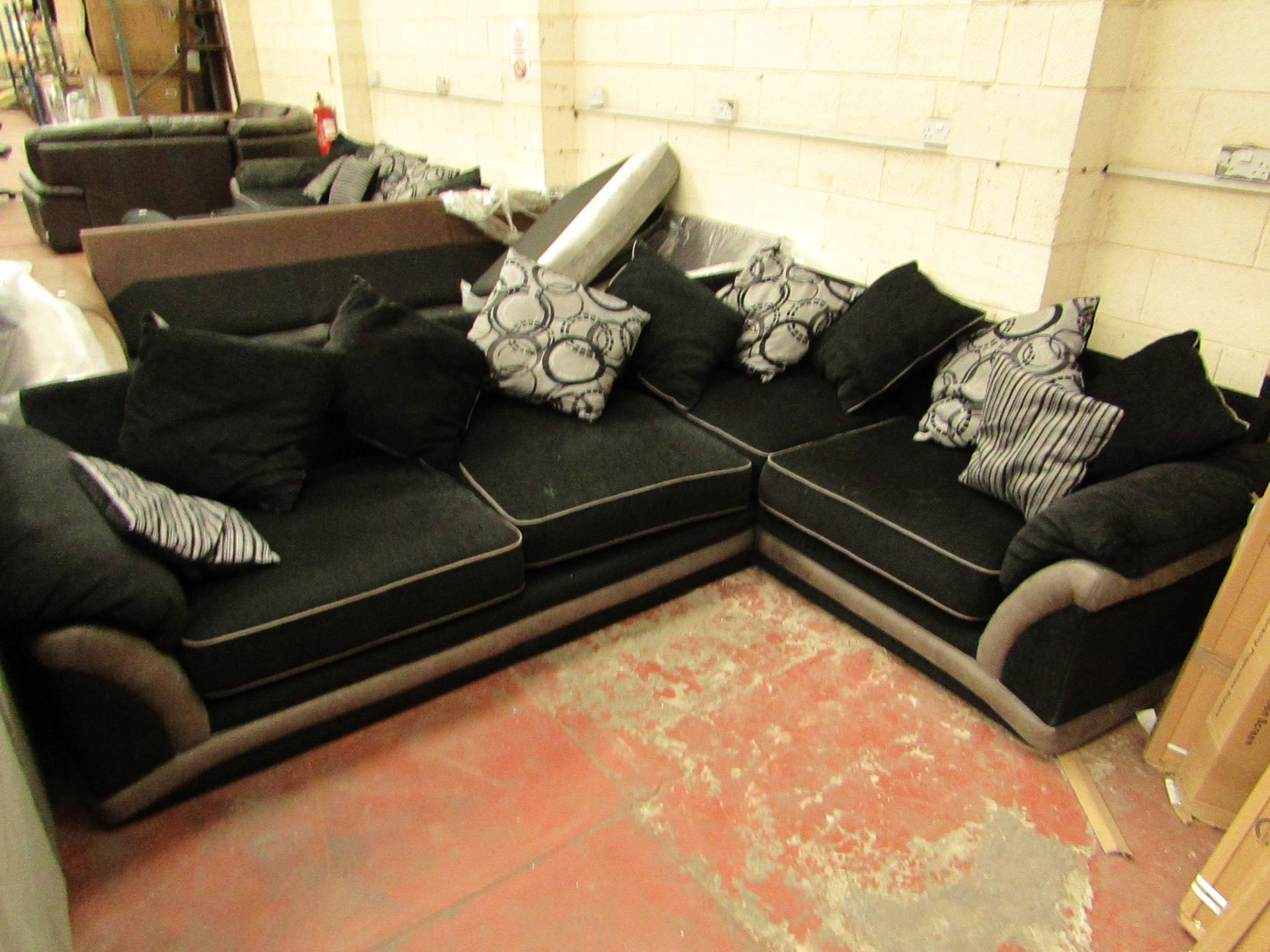 2 Piece 4 seater sofa with cushions , upon quick inspection no visual damage was found.
