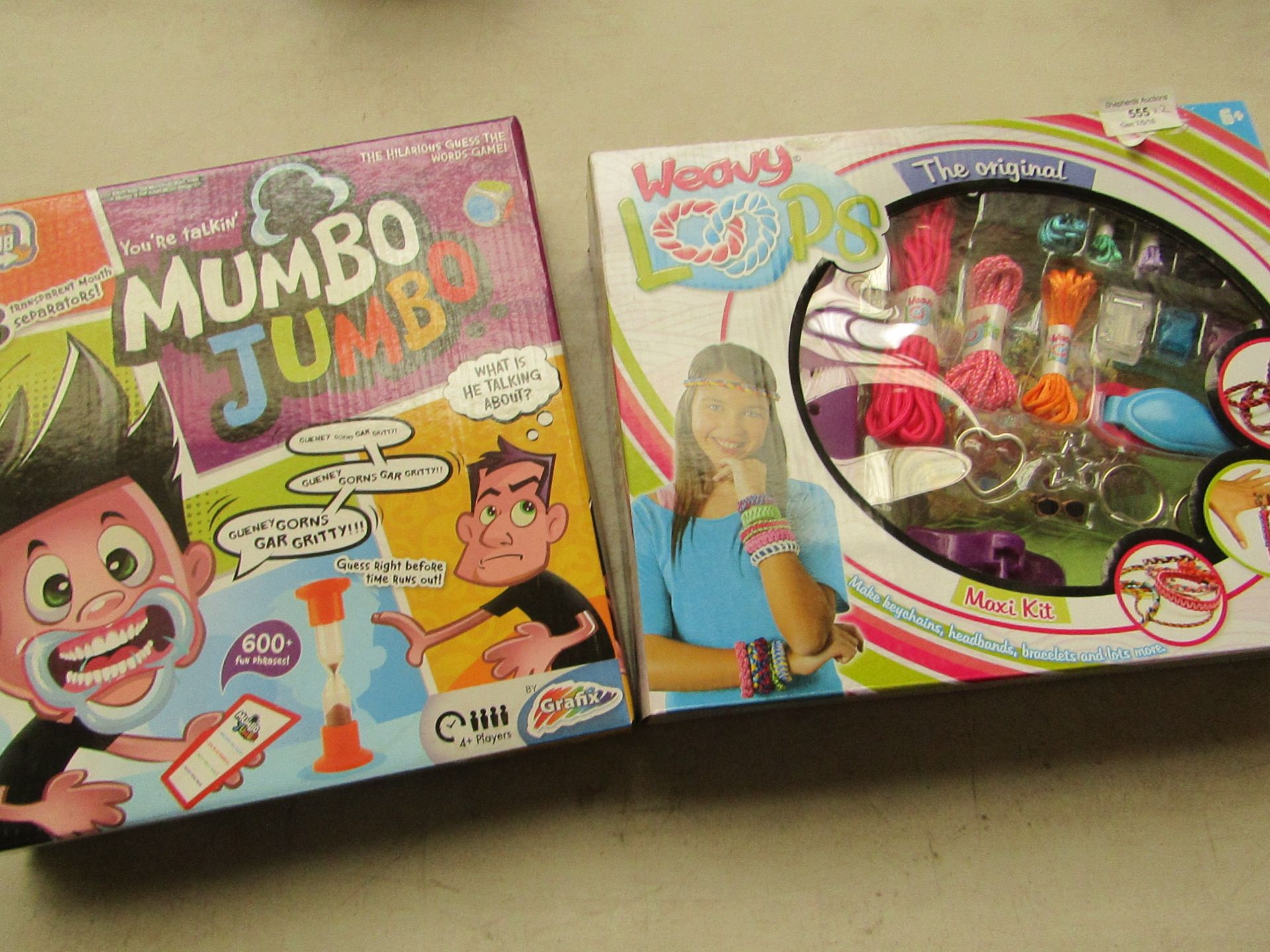 2x Items being; Weavy Loops maxi kit, new and boxed Games Hub mumbo jumbo games, new and boxed