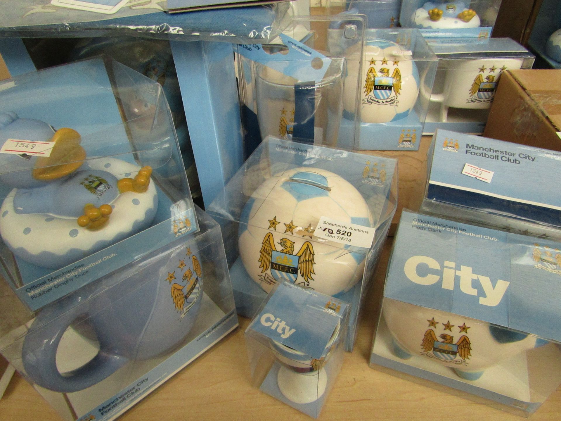 10x Manchester City official merchandise set, all new and packaged. Contains; Biscuit mug Egg cup 2x