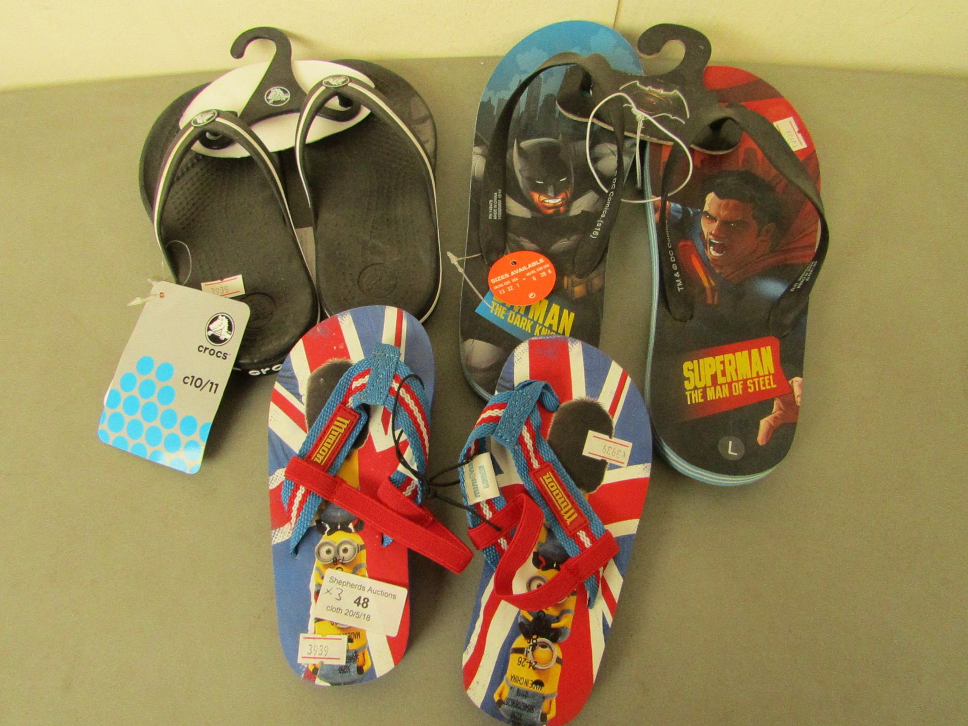 3 X Pairs of Flip-Flops,1 X Mens batman/superman approx size 7-8, 1 X Childrens Minions size 7-8,