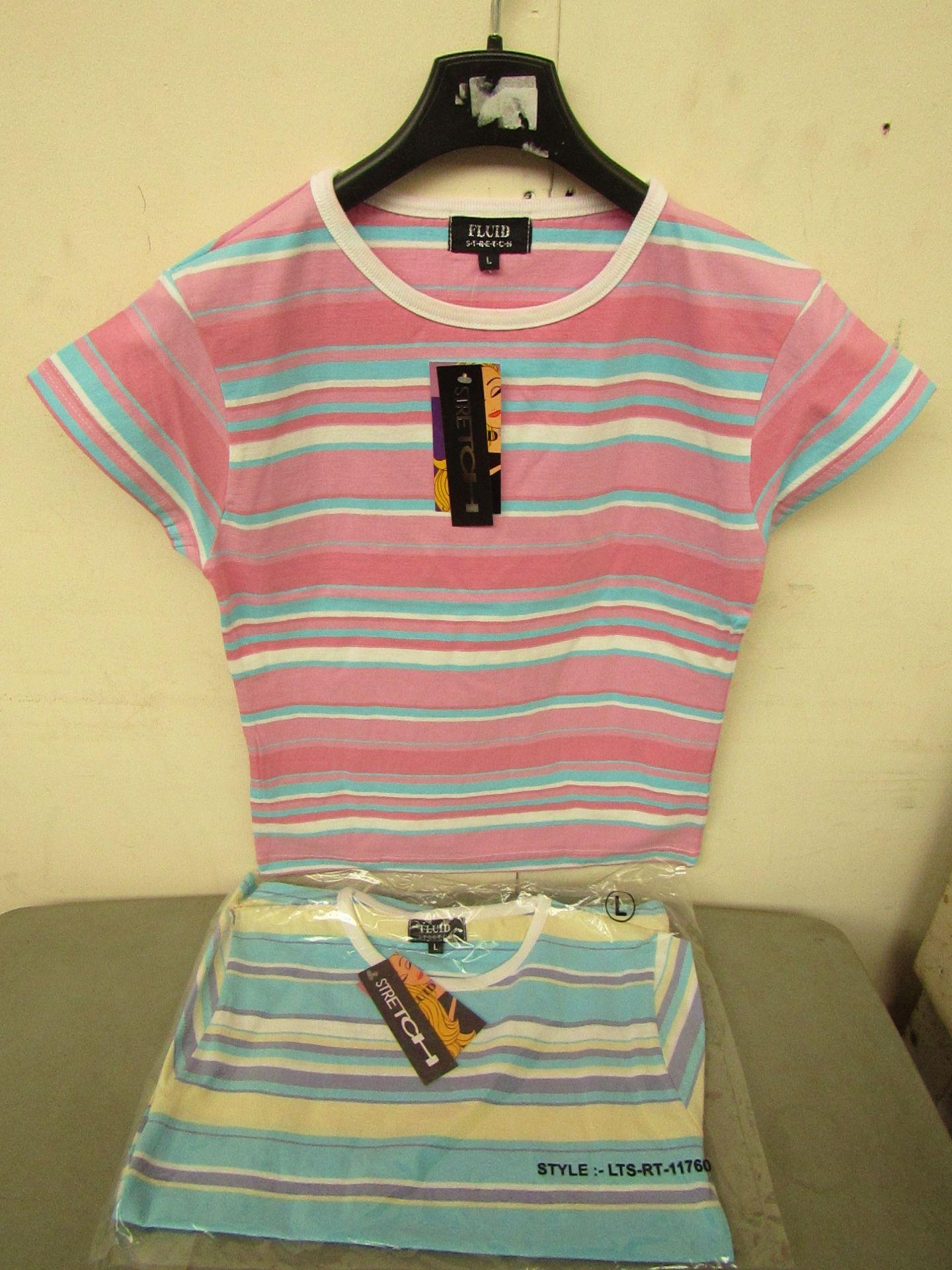 46 X Ladies stretch t/shirts,sizes range from Sml - Large,multi-colour stripe,all new in packaging