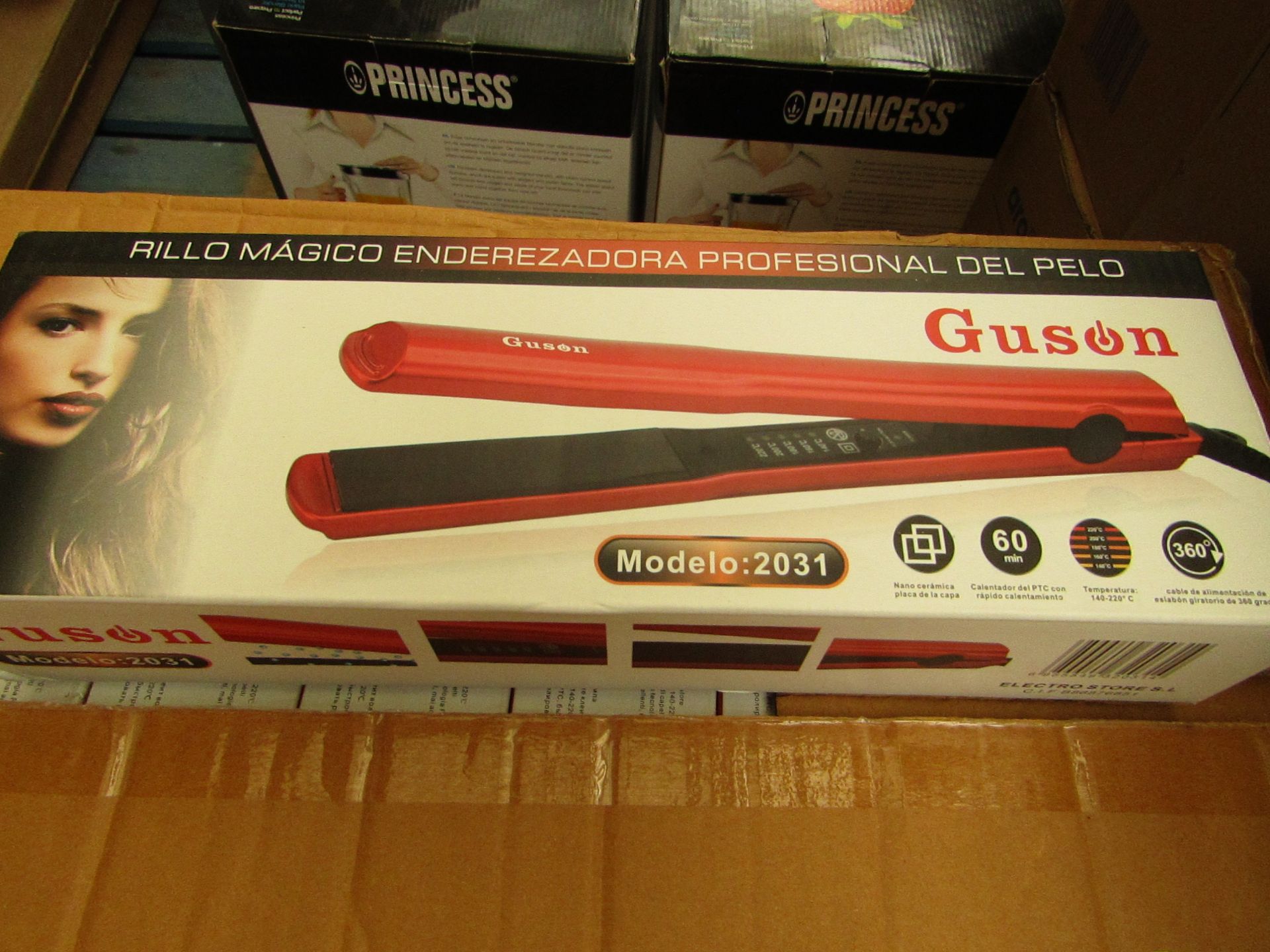 Guson professional hair straighteners, new and boxed. Foreign writing on the box and comes fitted