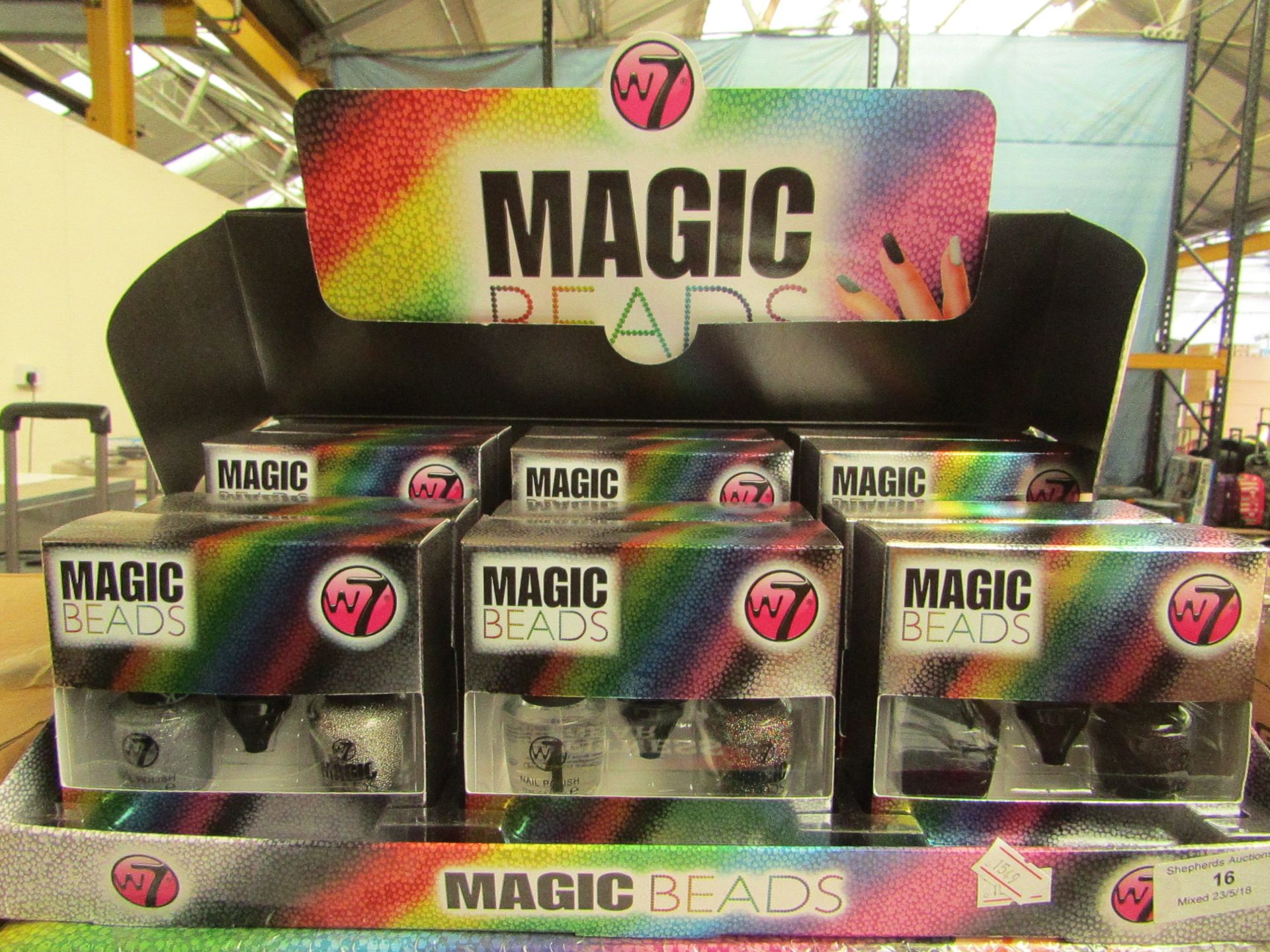 Display box containing 12x Magic Beads nail beads with nail polish, all new and packaged.