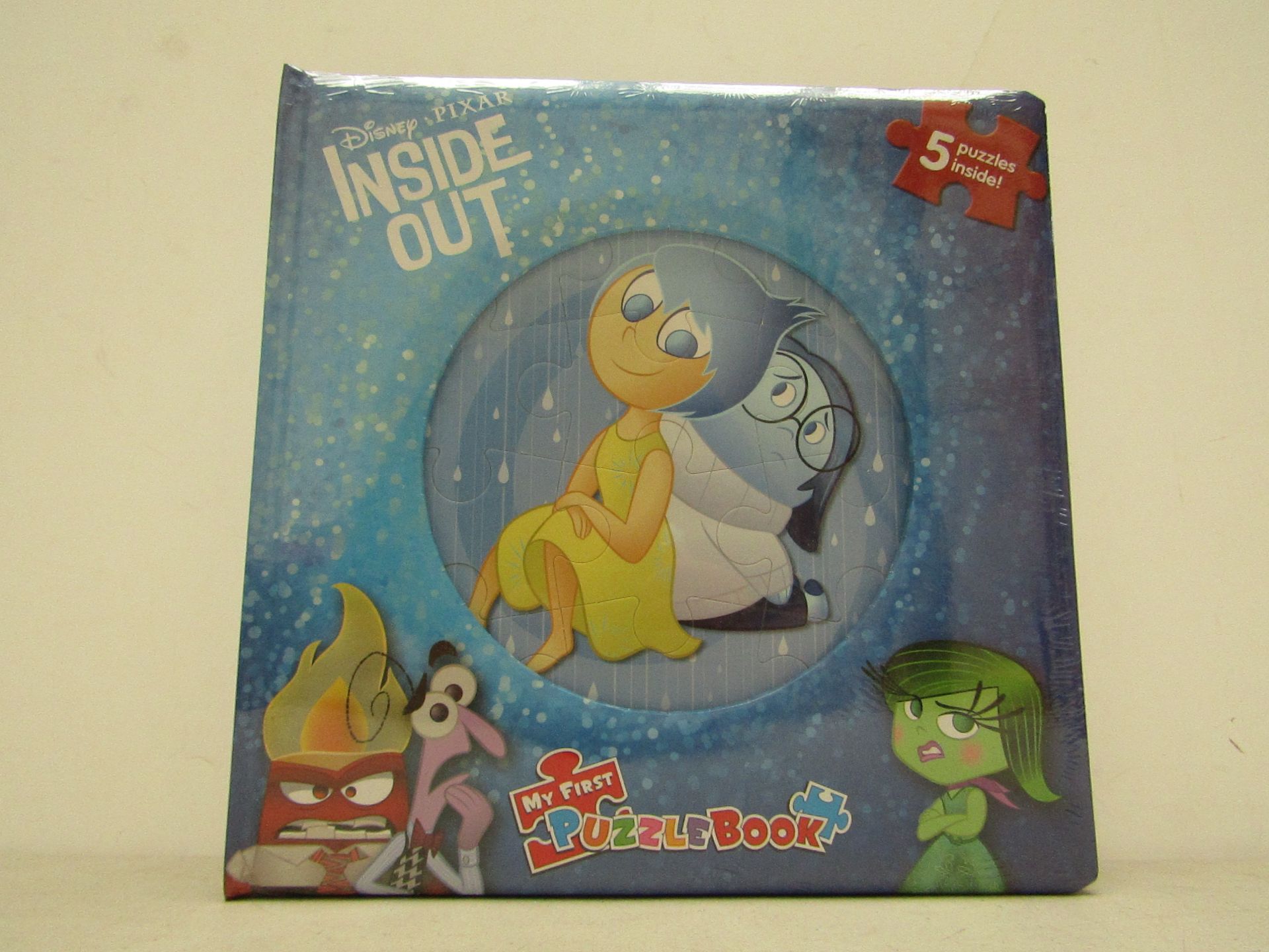 Box of 12x Disney Pixar Inside Out book containing 5 puzzles, new and packaged.