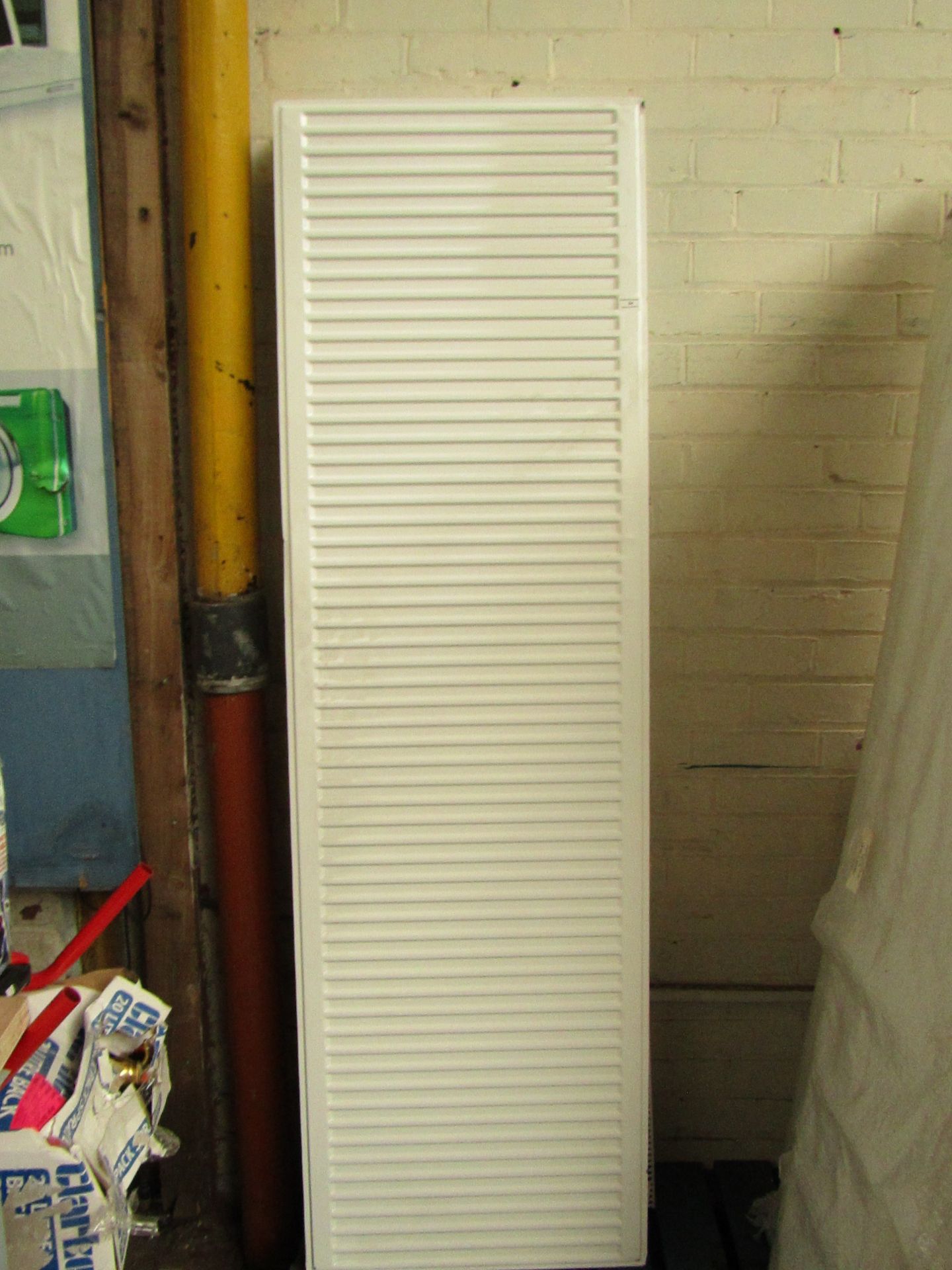 White double radiator approx 1.8mtrs long, slight chips and a small dent on one end