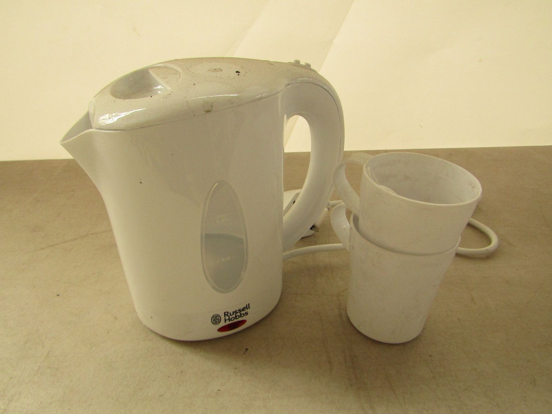 Russell Hobbs Classic Travel Kettle set includes a Mains Powered kettle, 2 mugs and 2 spoons, boxed.