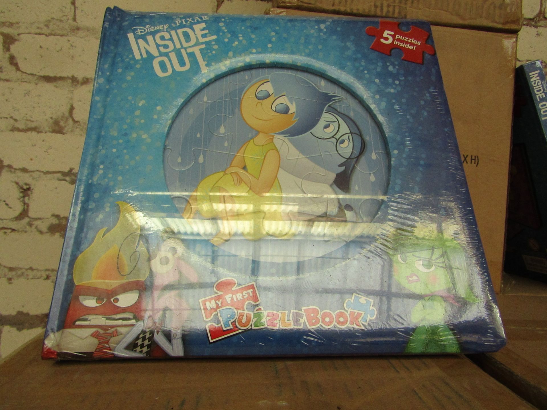 2x Disney Pixar Inside Out book containing 5 puzzles, new and packaged.