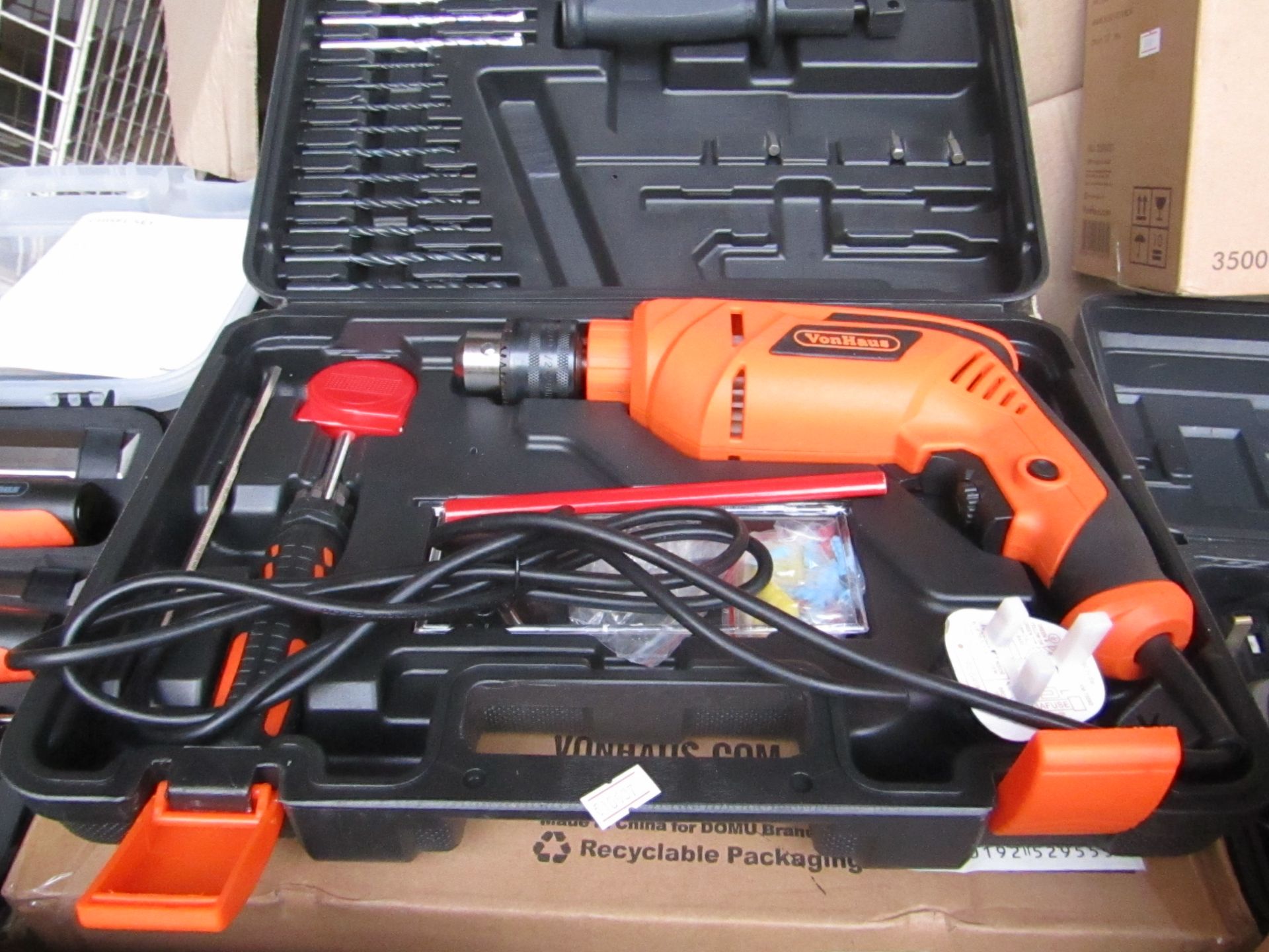 710w Impact drill with accessory set, tested working, complete and boxed. Please note by bidding
