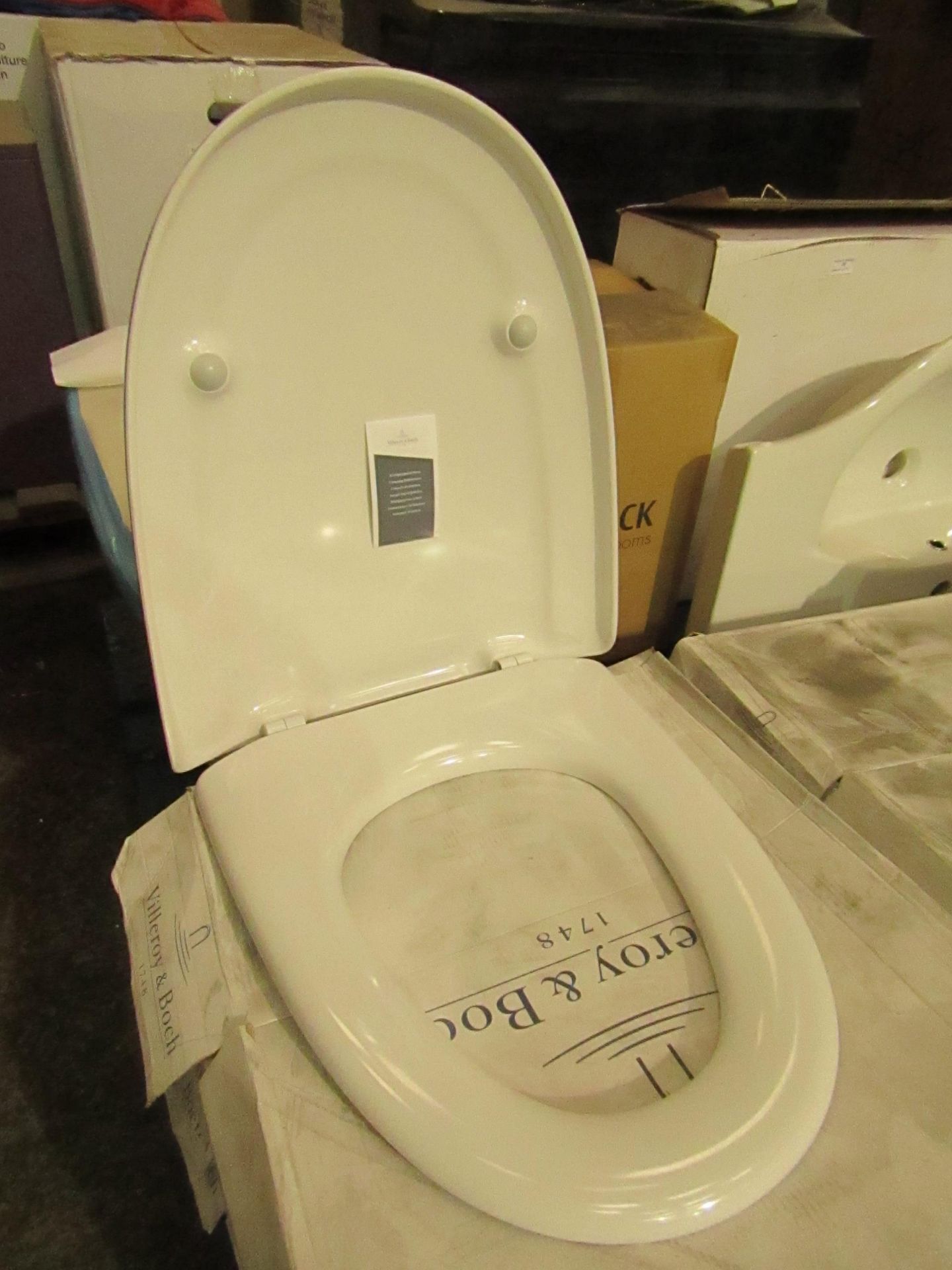 Villeroy and Boch toilet seat with cover, brand new and boxed.