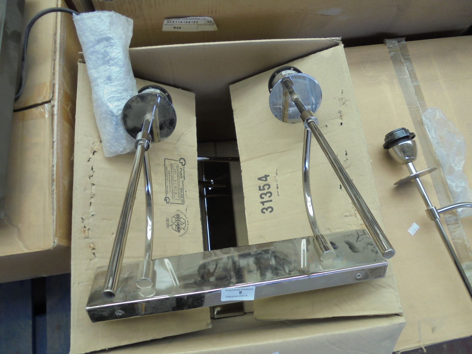 Pair of Chelsom wall hung lights, new and boxed.