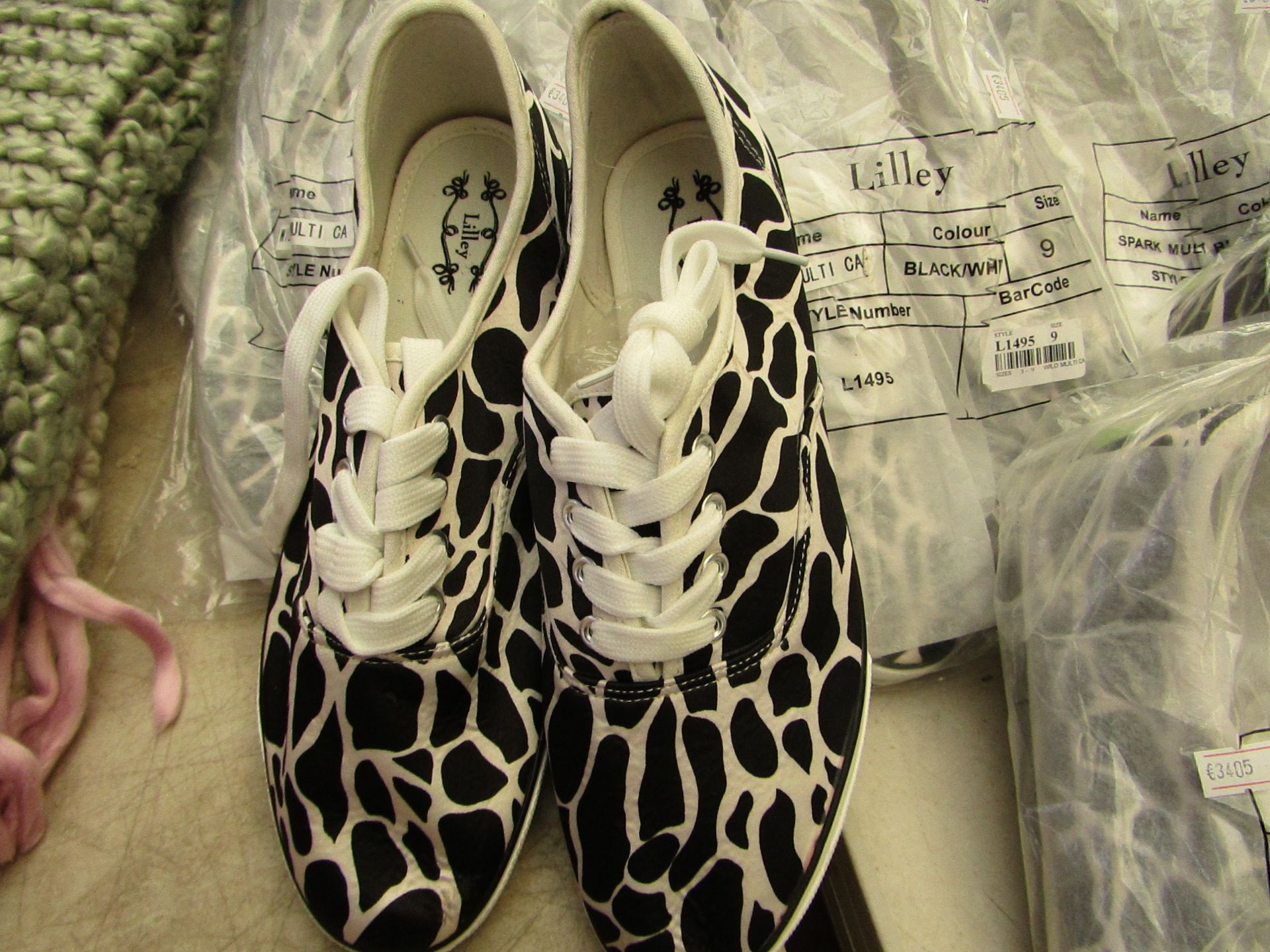 3 X Pairs of Animal Print Canvas shoes all size 9 all new & packaged